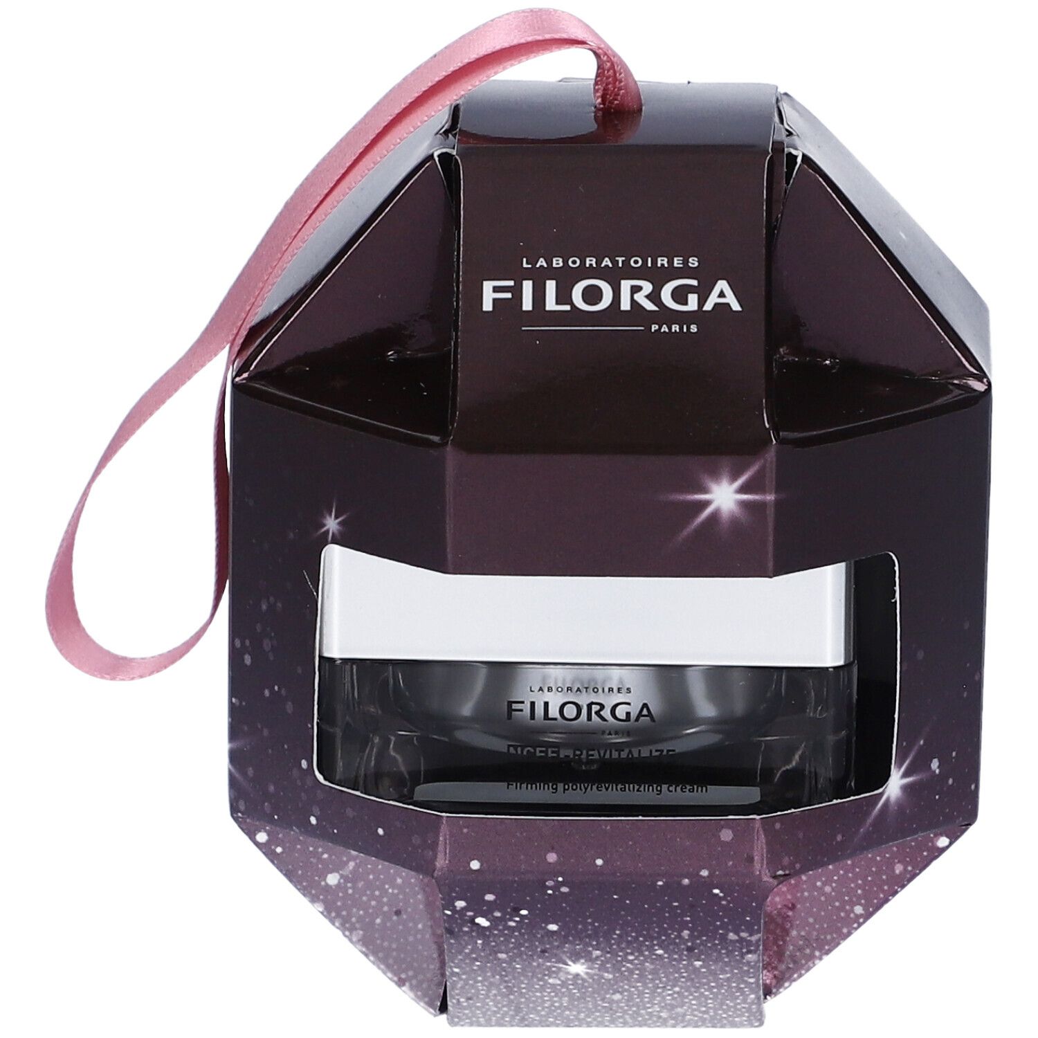Crema Filorga in confezione regalo. Scatola sfaccettata marrone scuro, nastro rosa. Prodotto visibile.