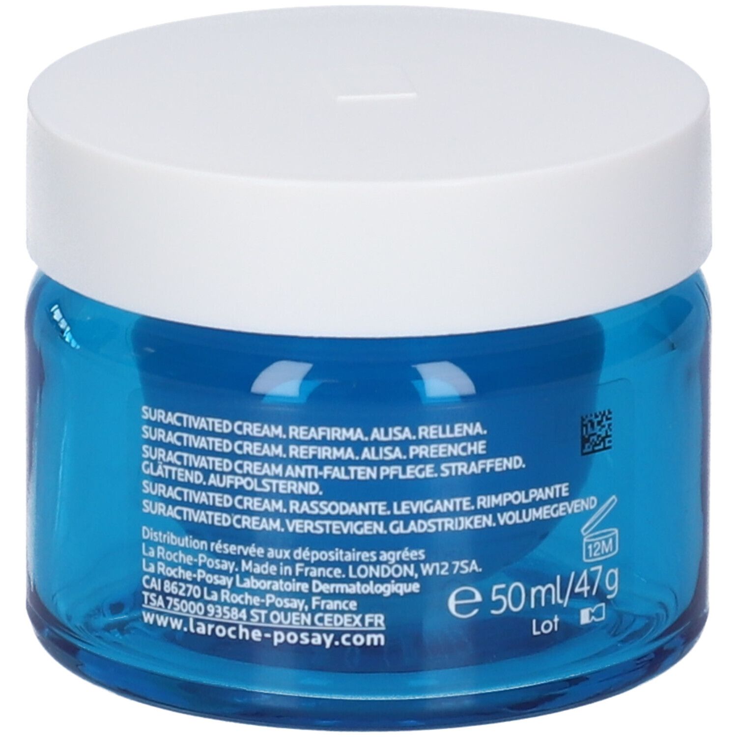 Vasetto di vetro blu con coperchio bianco. Scritta: La Roche-Posay Hyalu B5 Crème Suractivée. Testo.