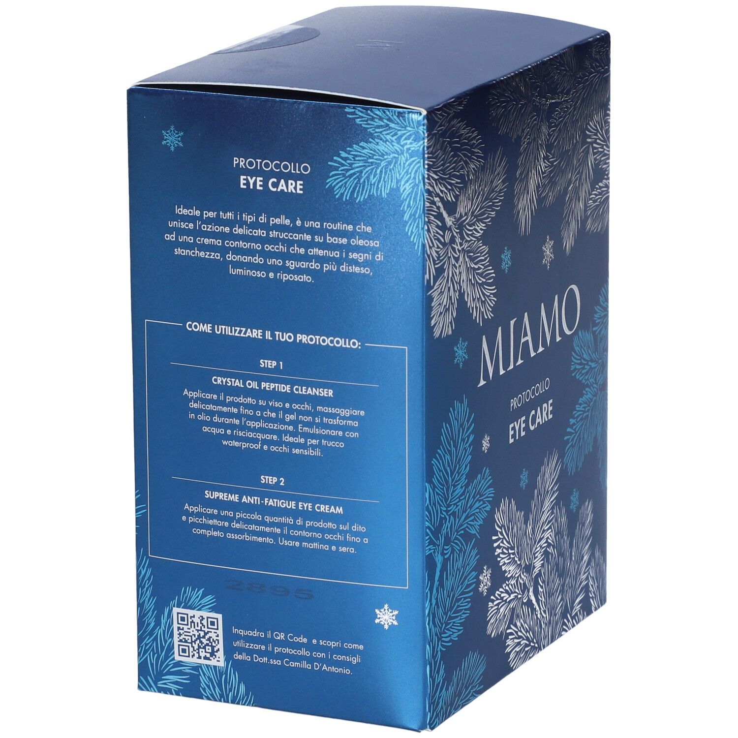 Retro della confezione regalo con testo. Contiene istruzioni per l'uso e codice QR. Miamo Eye Care.