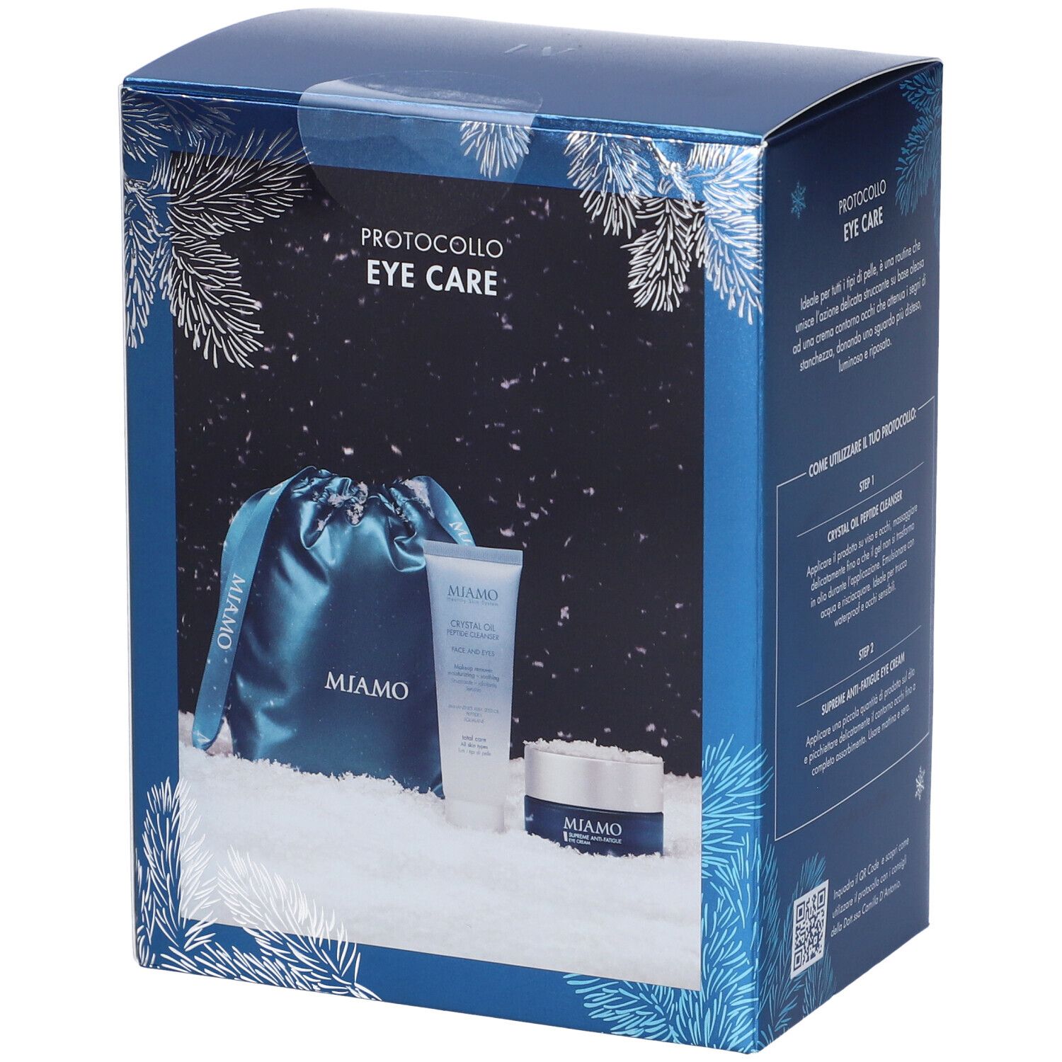 Confezione regalo con prodotti: crema, detergente e pochette. Su decorazione neve. Miamo Eye Care.