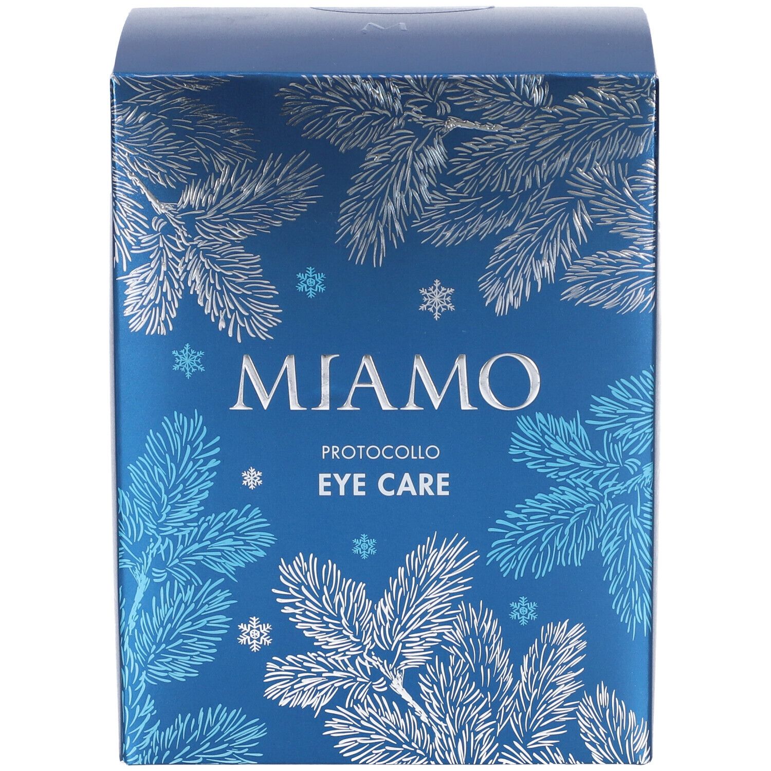 Fronte della confezione regalo con logo Miamo e scritta Eye Care. Design con rami di pino.
