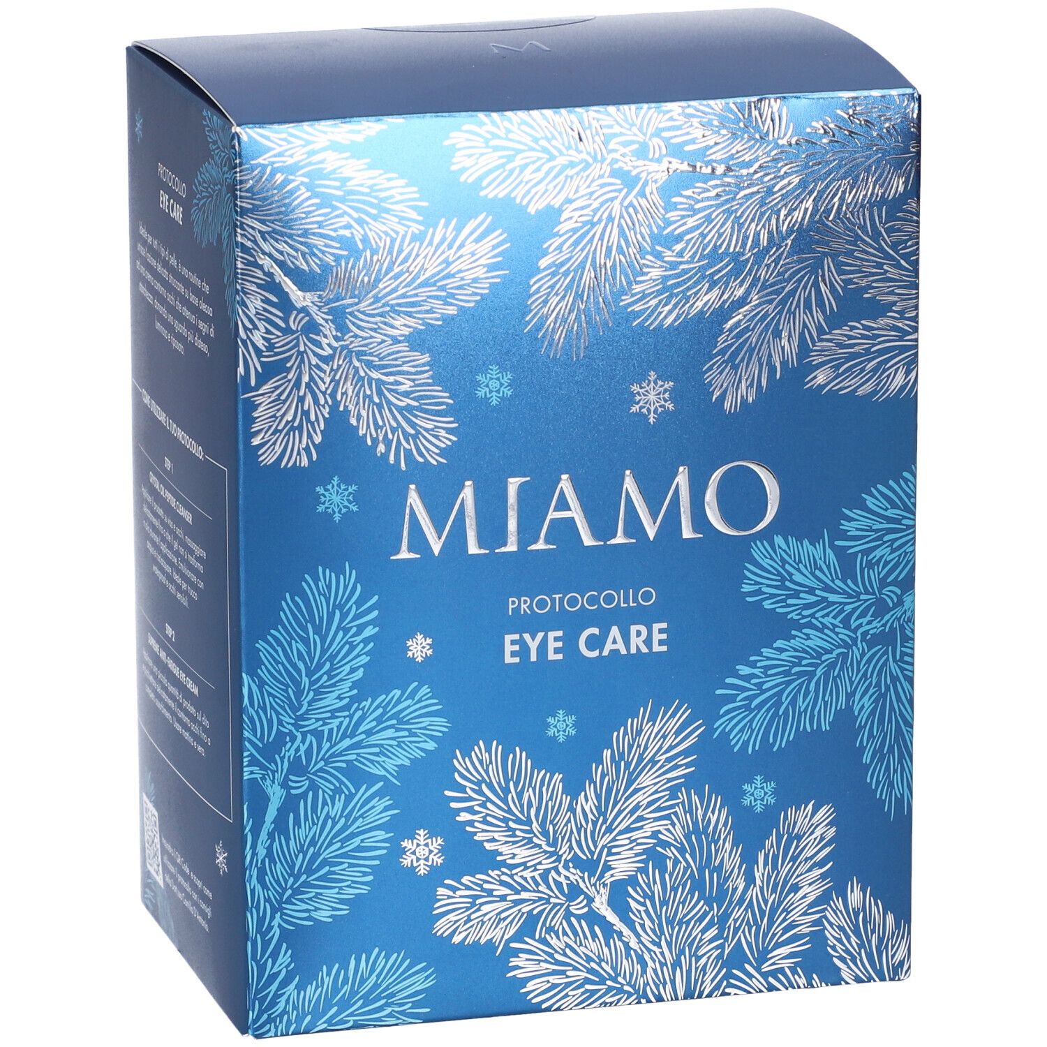 Confezione regalo con logo Miamo e scritta Eye Care. Design con rami di pino. Confezione.