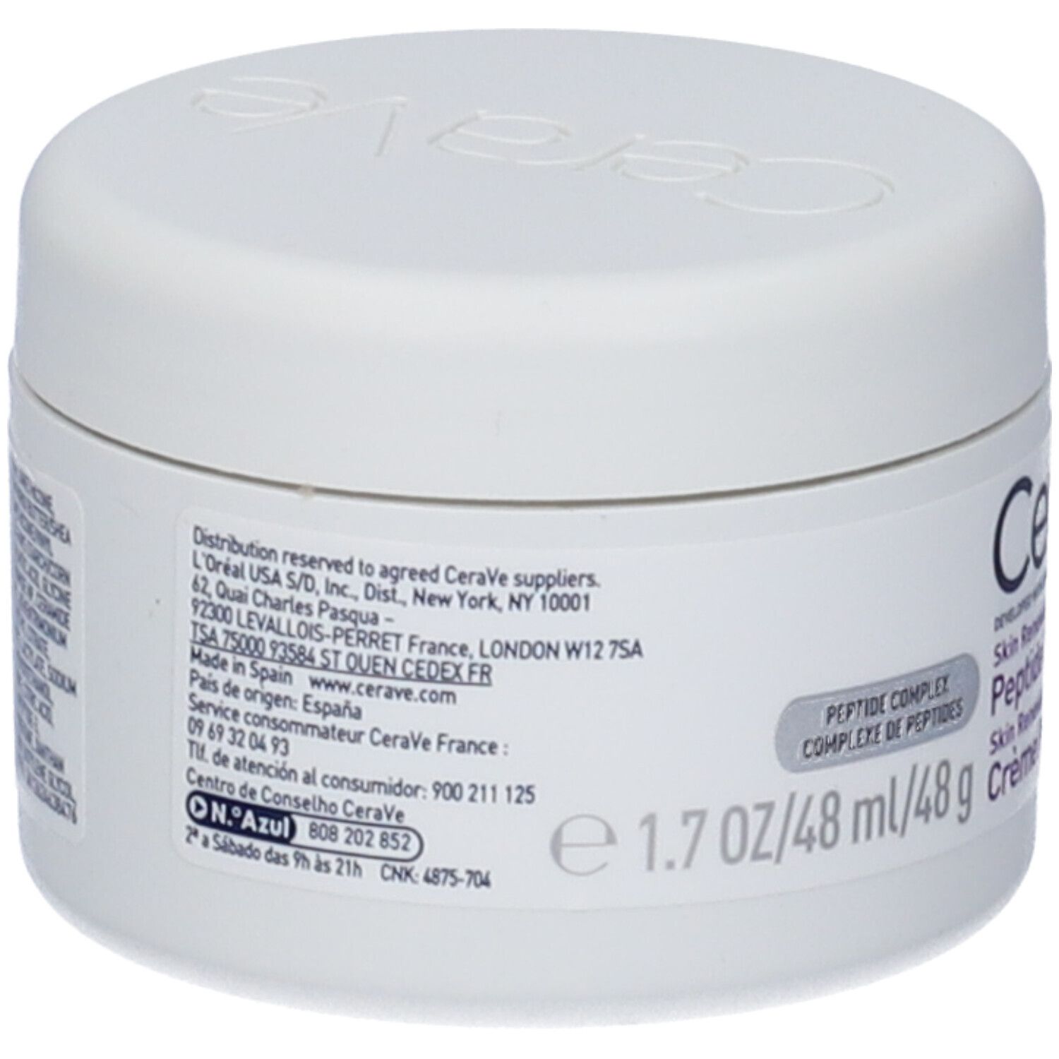 Vaso bianco con coperchio. Etichetta: CeraVe, Skin Renewing Peptide Cream. Accento viola. 1.7 oz/48 ml/48 g. Testo sul retro.