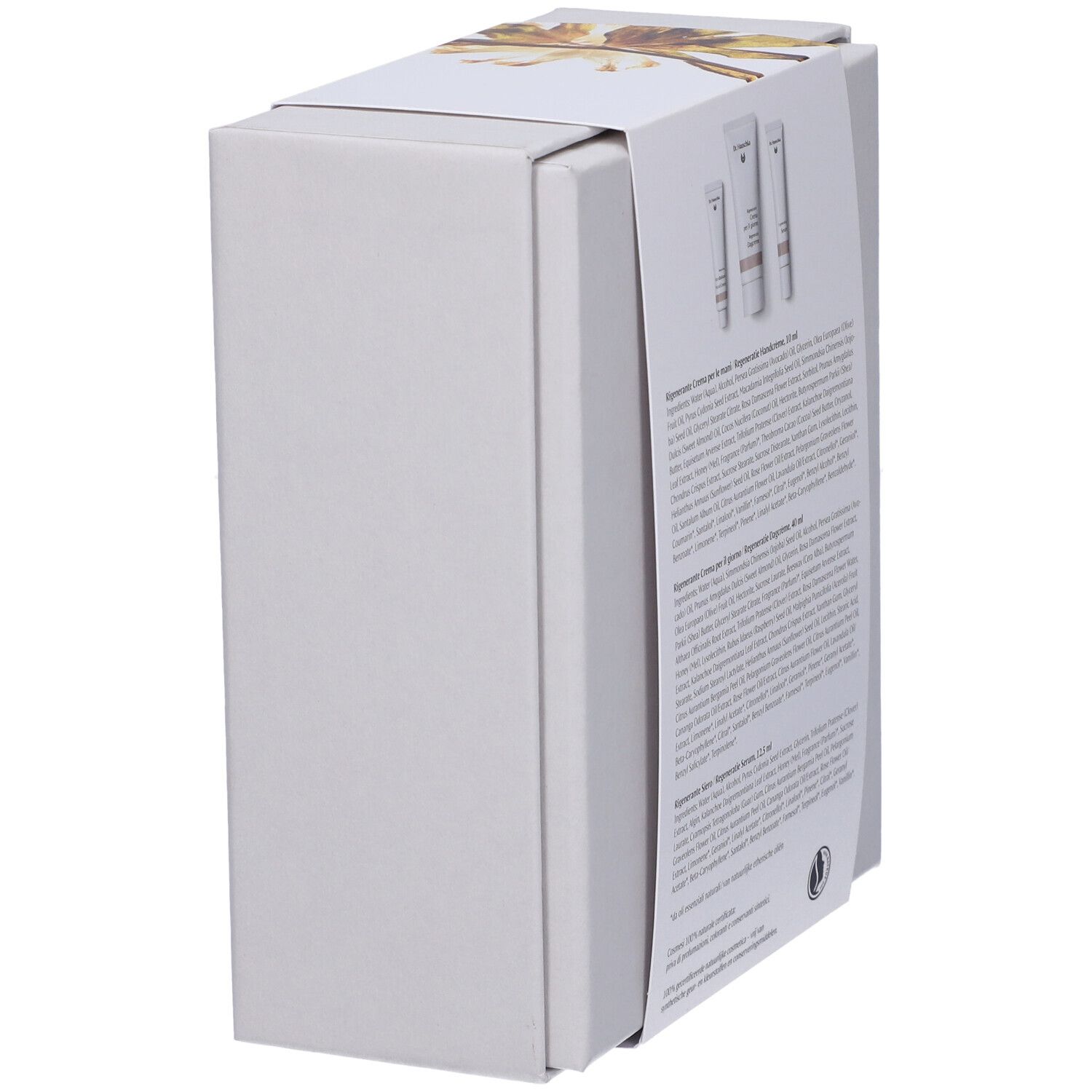 Confezione regalo, vista laterale. Testo: crema mani, giorno, siero. Logo.