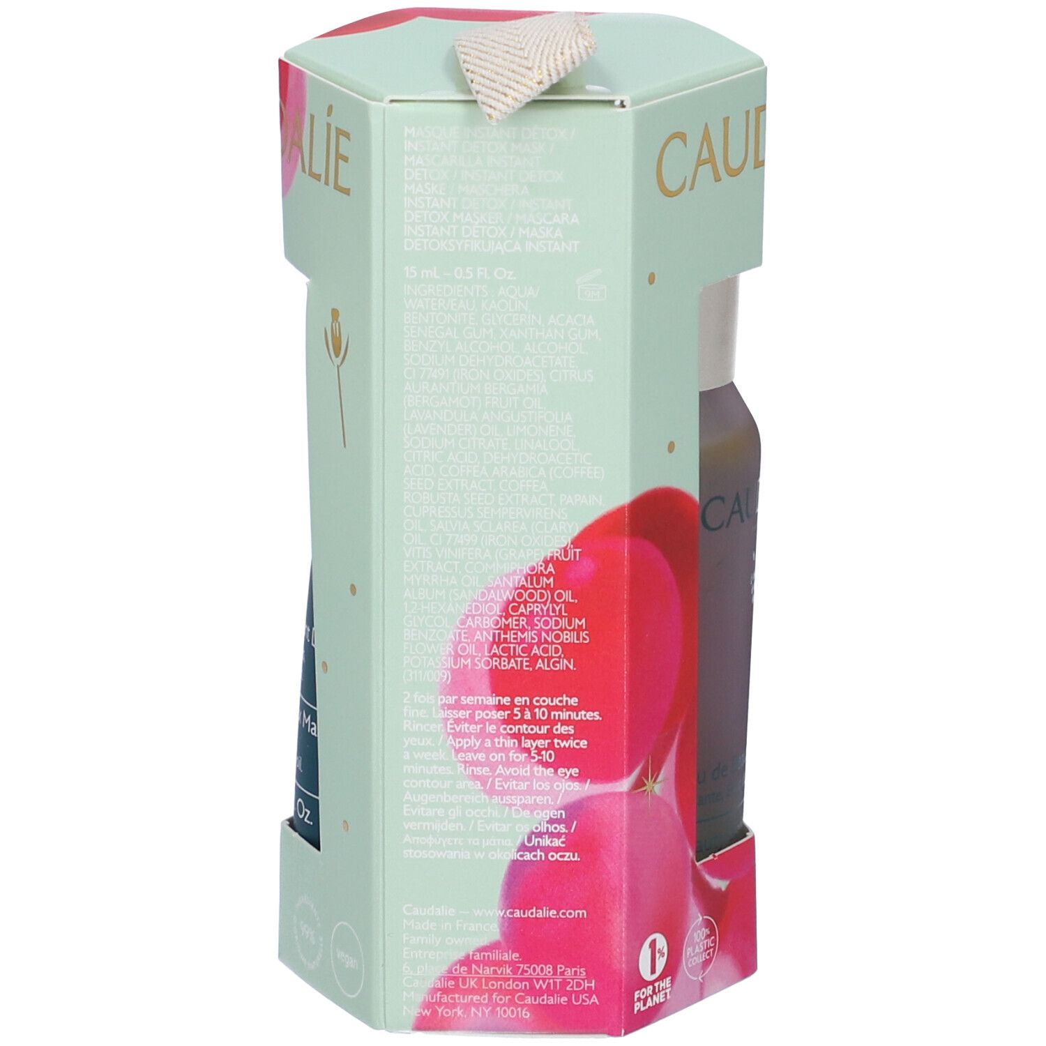 Retro della confezione regalo. Testo e informazioni sul prodotto. Verde menta con dettagli rosa.