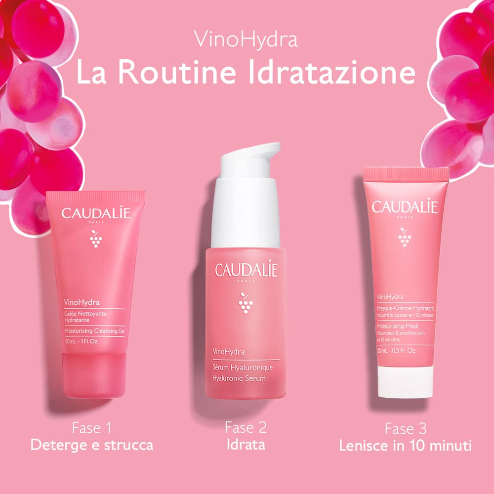Tre prodotti Caudalie rosa: siero, gel detergente e maschera. Testo: La Routine Hydratation.