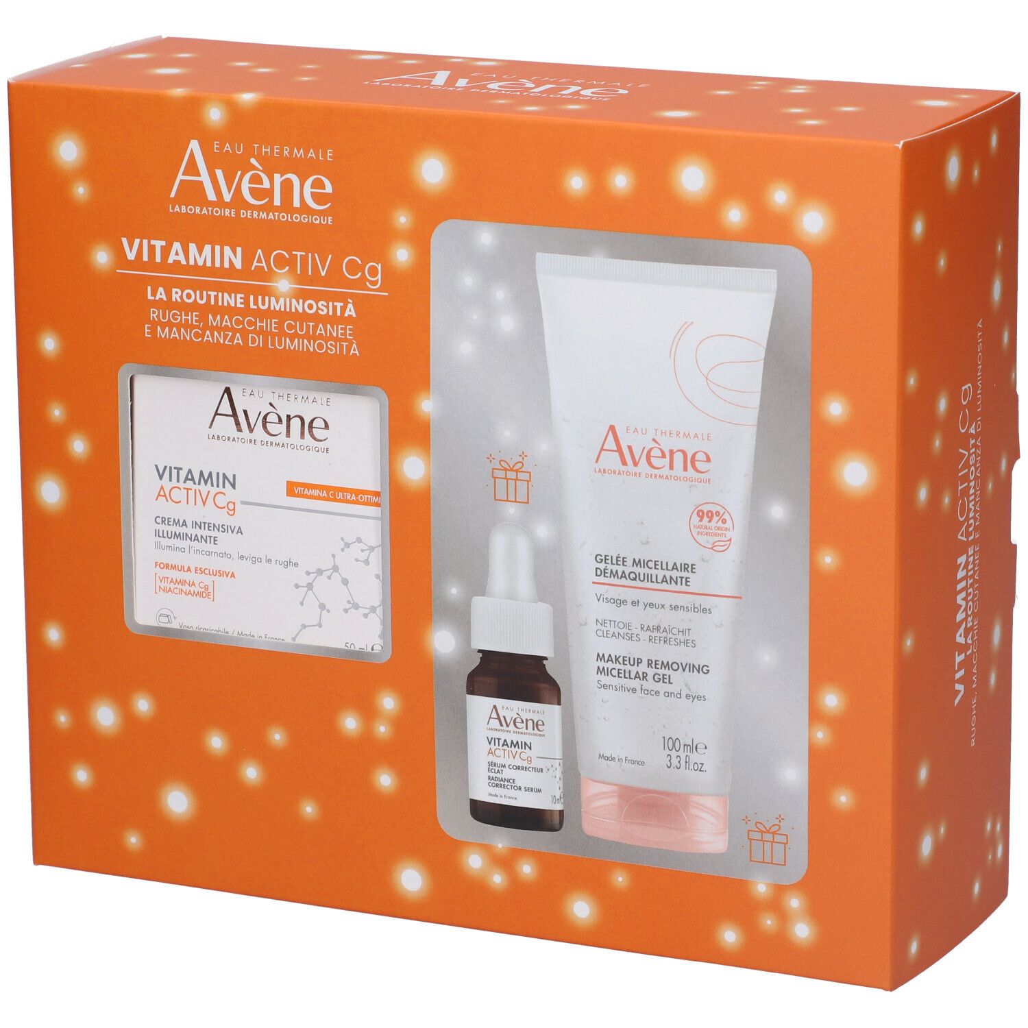 Cofanetto regalo con tre prodotti in una scatola arancione. Prodotti visibili attraverso una finestra.