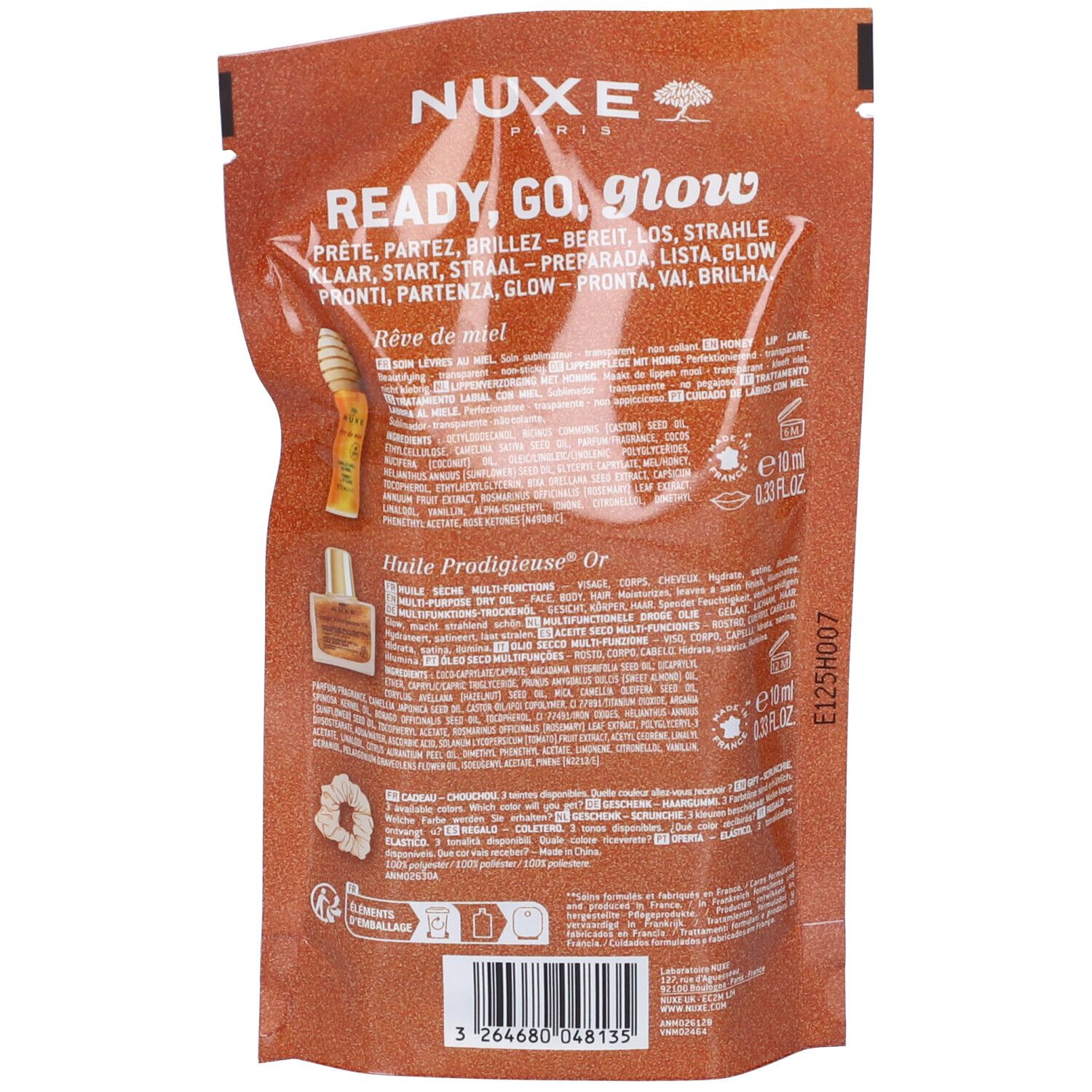 Retro della confezione regalo. Contiene informazioni sul prodotto e codice a barre. Scritta: Nuxe Paris, Ready, Go, Glow.