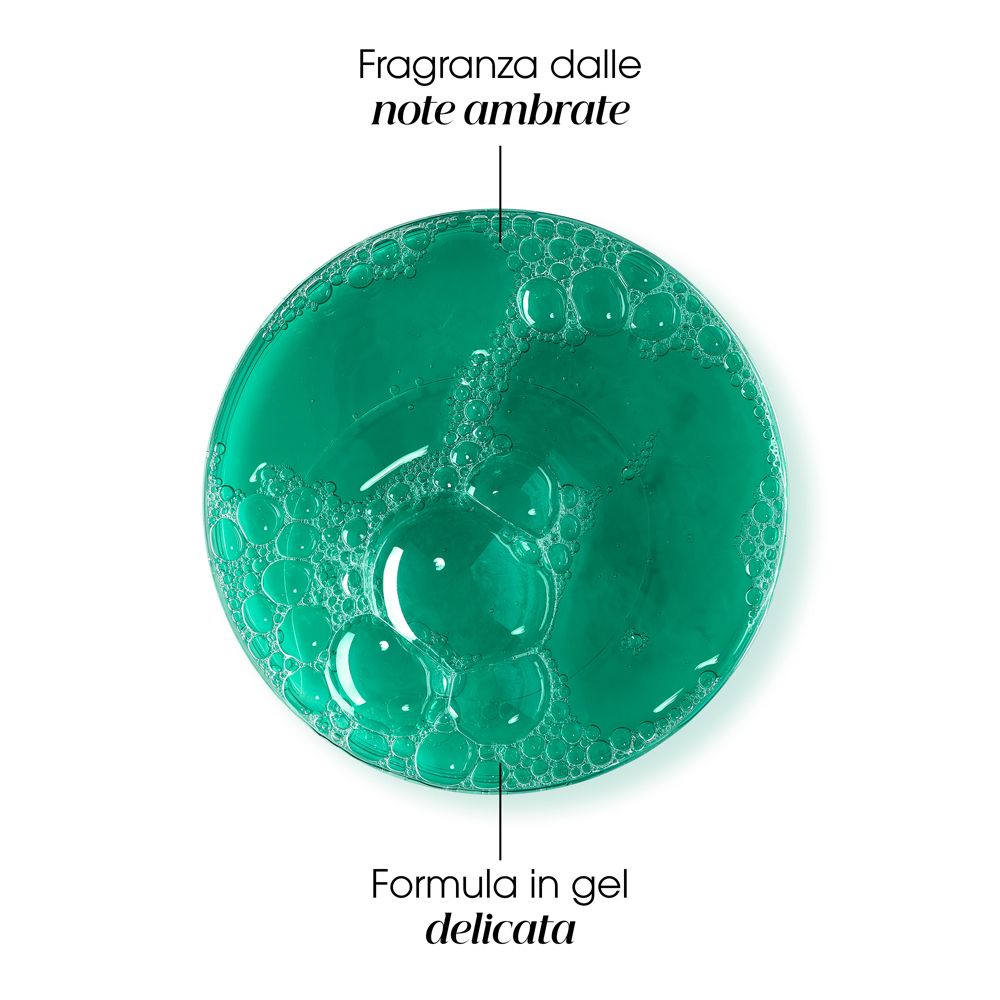 Liquido verde con bolle. Testo: Fragranza dalle note ambrate. Formula in gel delicata.