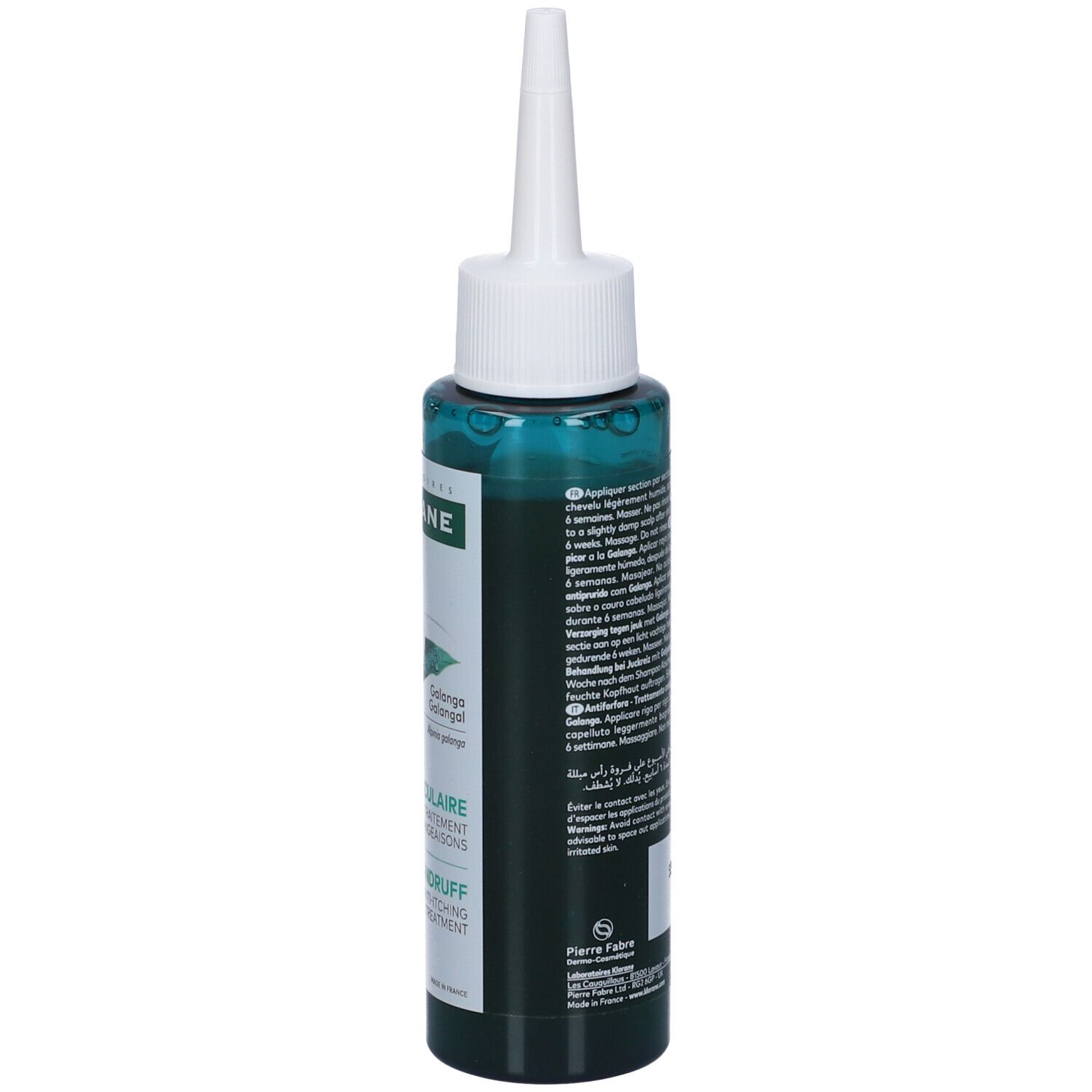 Flacone verde con applicatore bianco. Scritta: Klorane, trattamento antiforfora. Immagine di zenzero.