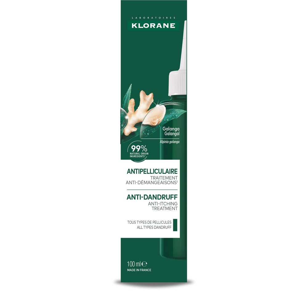 Confezione verde con flacone e applicatore bianco. Scritta: Klorane, trattamento antiforfora. Zenzero.
