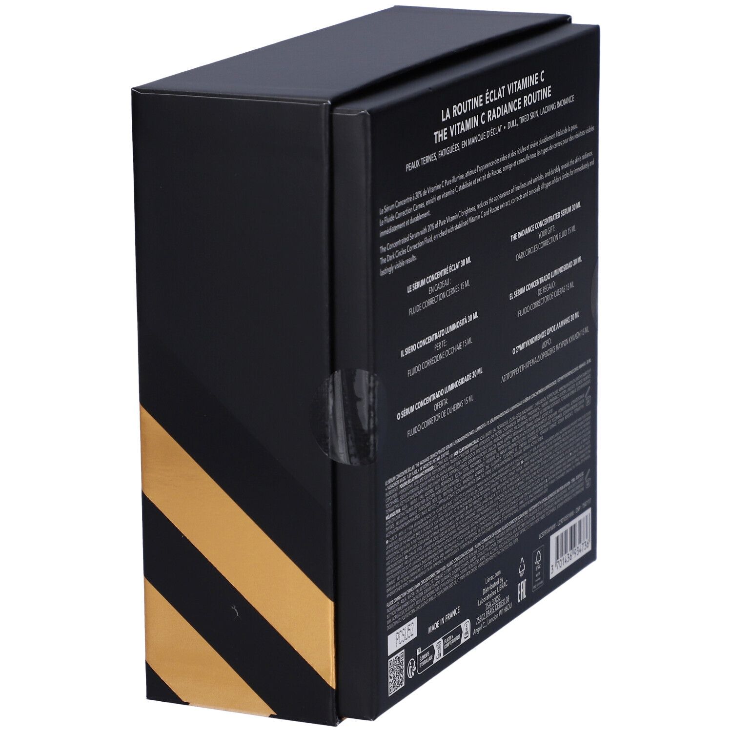 Vista laterale della confezione regalo Lierac. Scatola nera con dettagli dorati. Testo e informazioni sul prodotto.