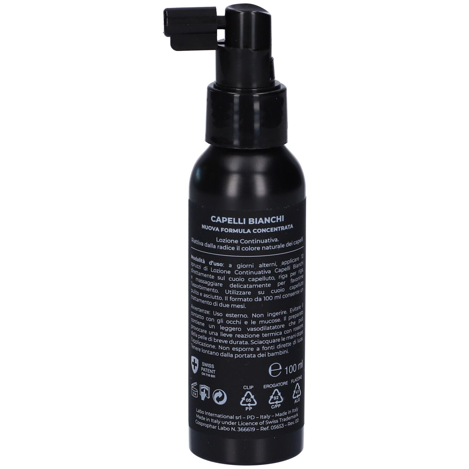 Flacone nero con erogatore. Scritte: CAPELLI BIANCHI, LOZIONE. Testo e simboli.