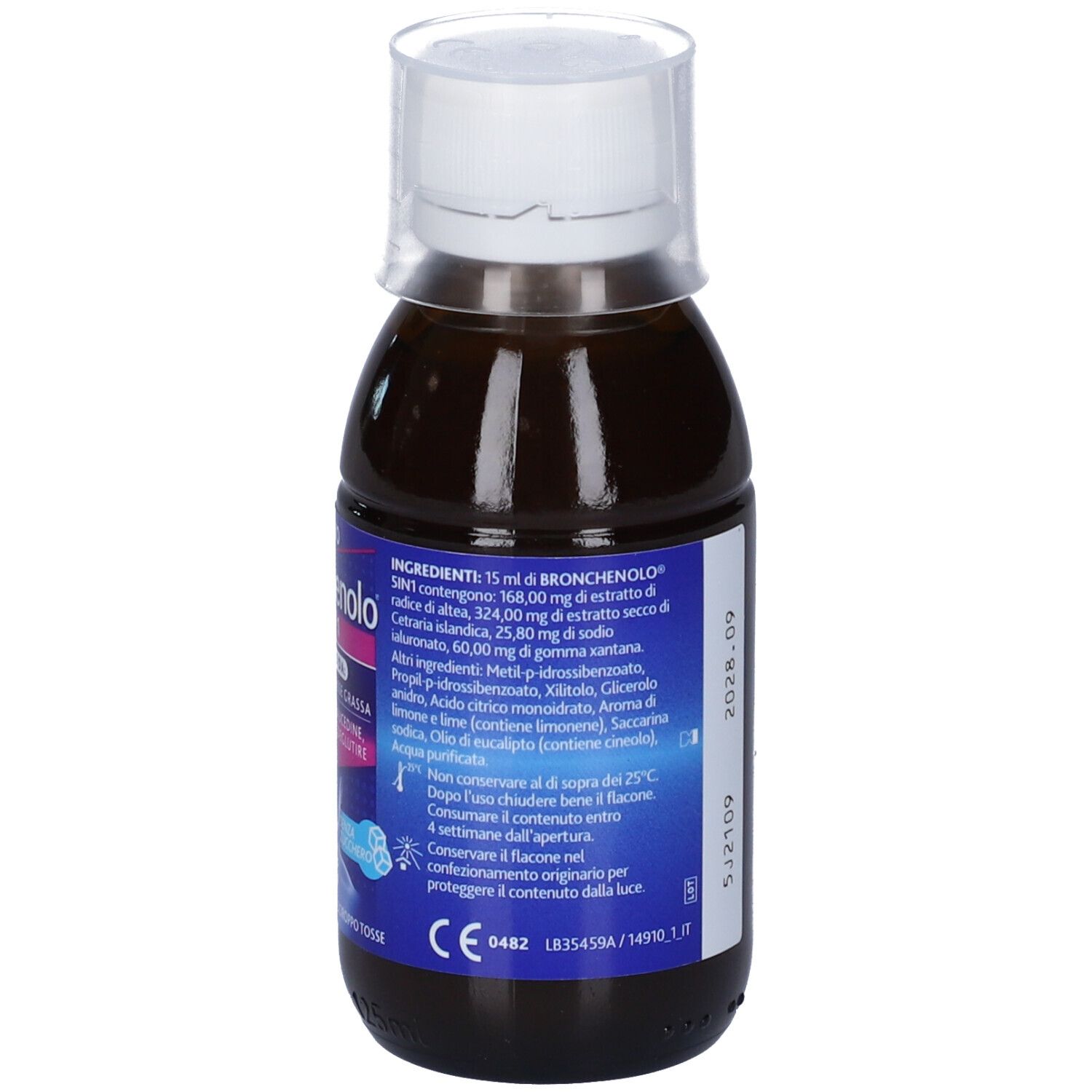 Bottiglia di liquido marrone con tappo bianco. Etichetta con ingredienti e altre informazioni sul prodotto.