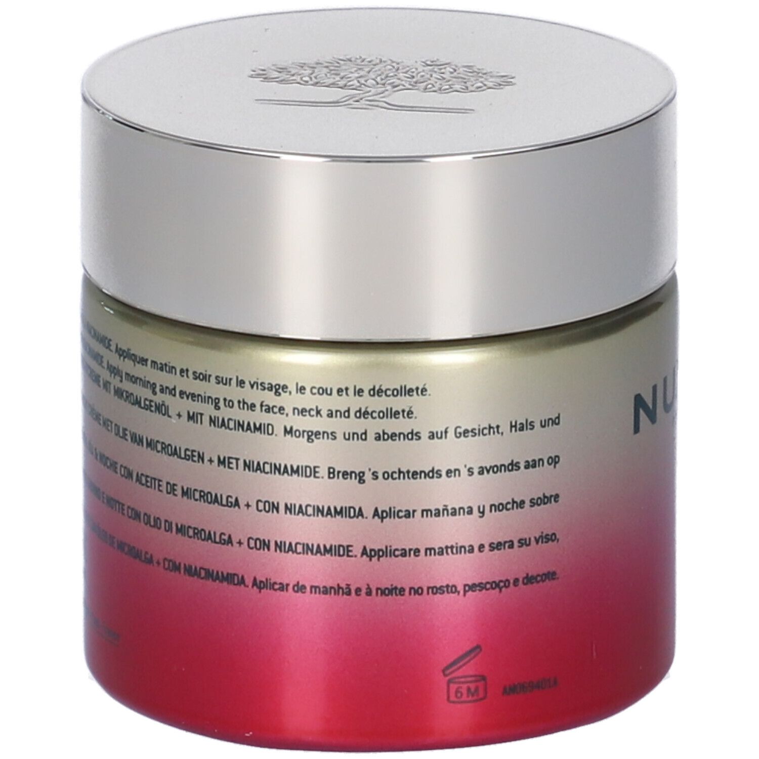 Vaso di crema con coperchio argentato. Scritta: Nuxe. Testo in più lingue.