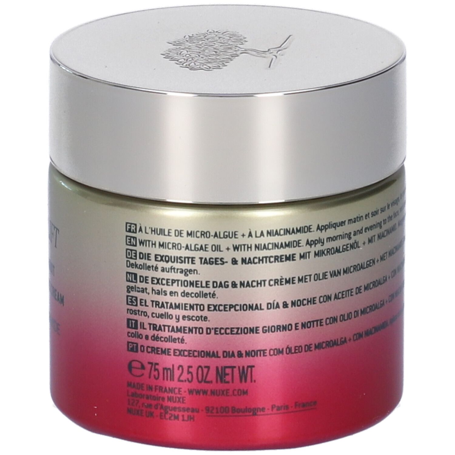 Vaso di crema con coperchio argentato. Scritta: Nuxe. Testo in più lingue.