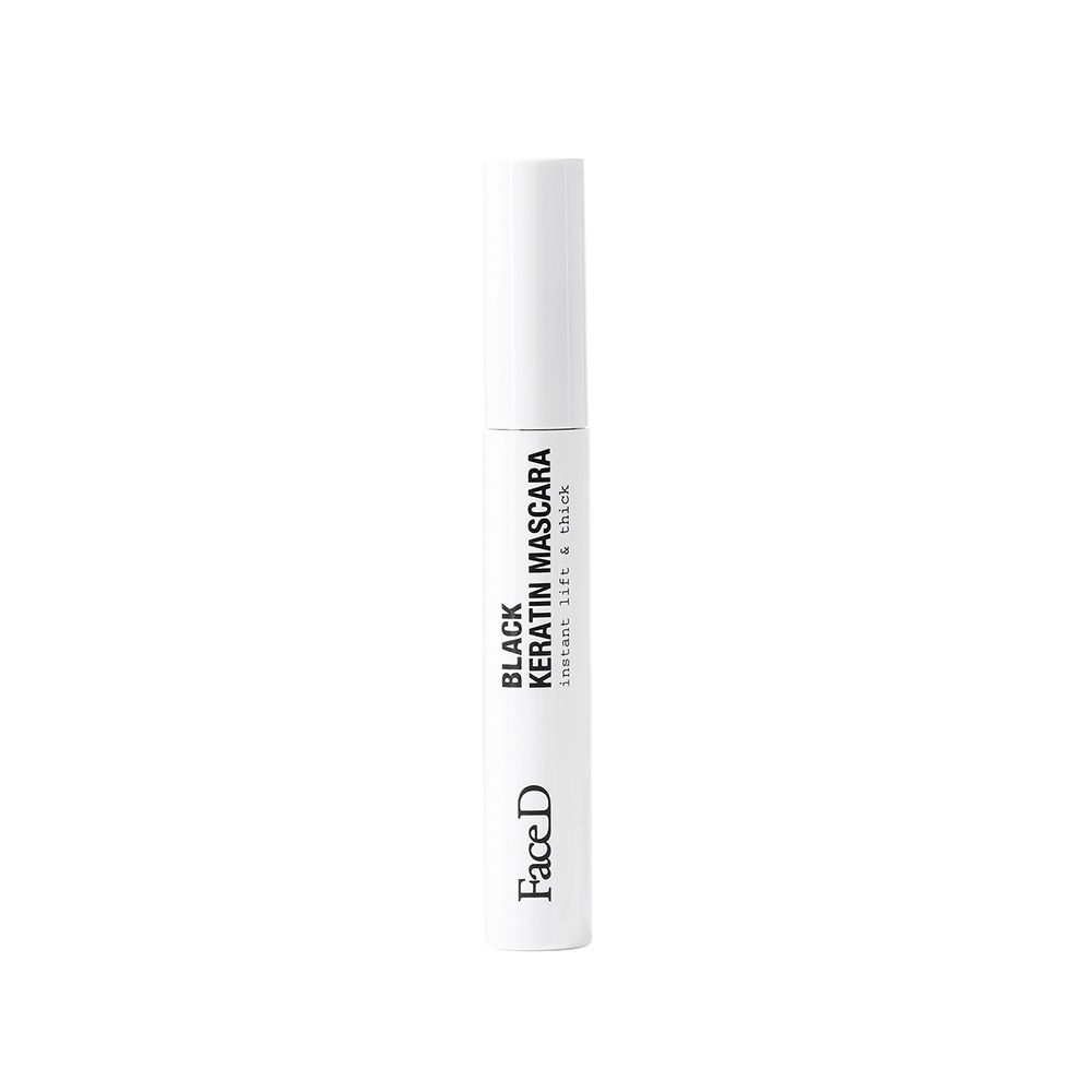 Tubo di mascara bianco con testo nero. Nome prodotto: Black Keratin Mascara. Marchio: Face D.