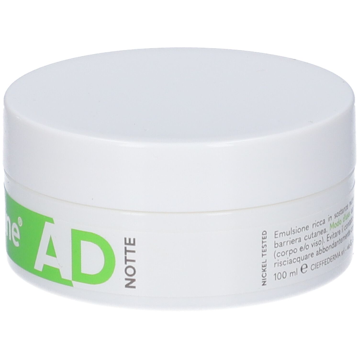 Vasetto bianco con scritta verde. Scritta: AD Notte.