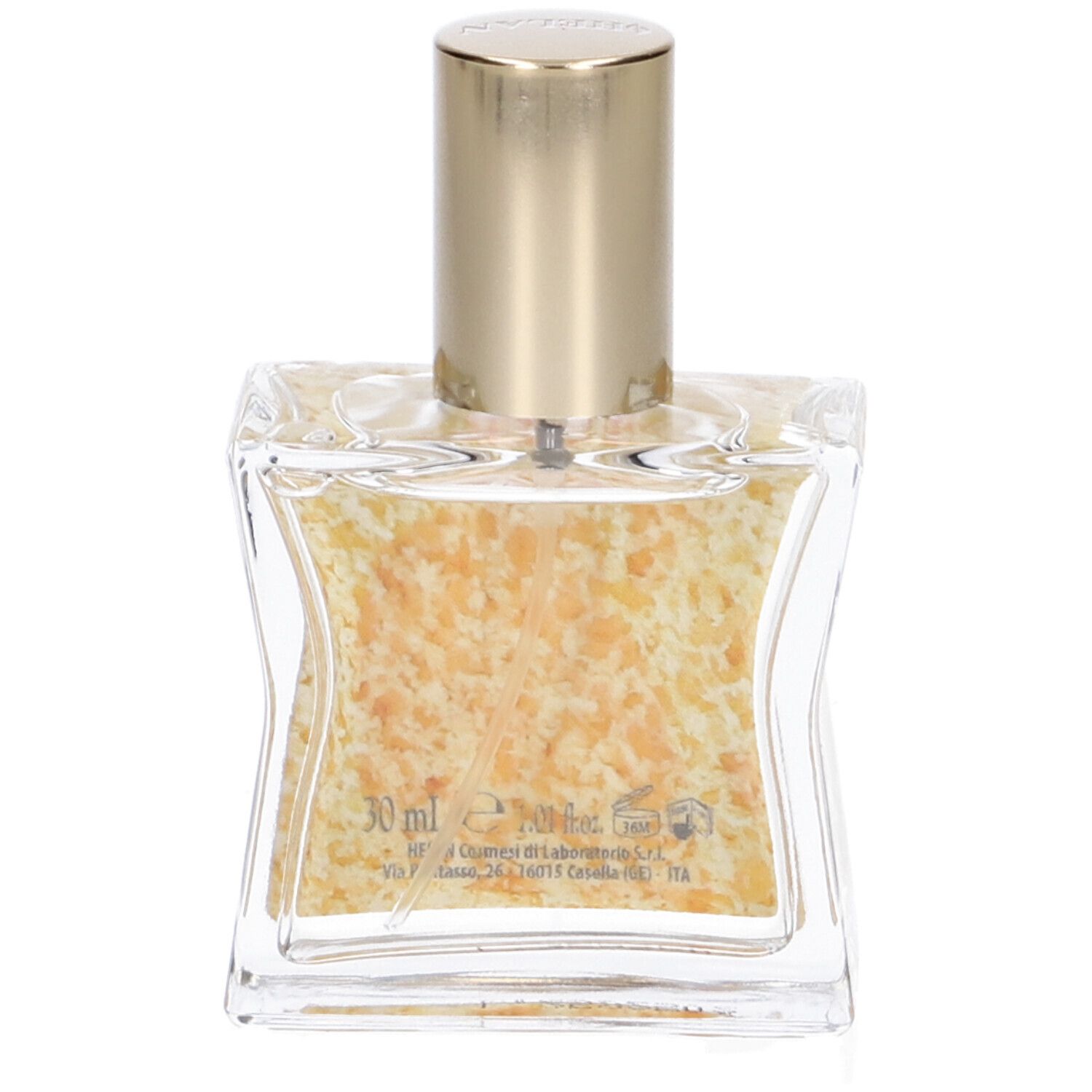 Flacone quadrato in vetro con tappo dorato. Liquido con particelle gialle.