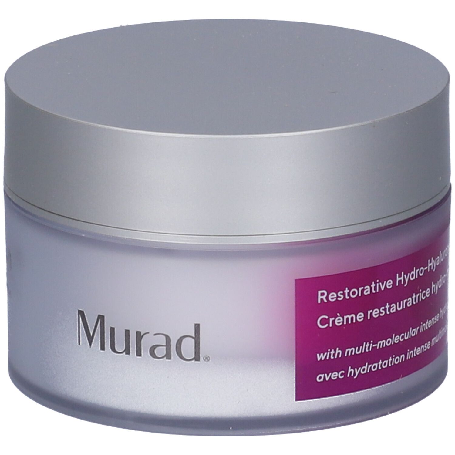 Vaso di crema con coperchio argentato. L'etichetta riporta "Murad" e informazioni.