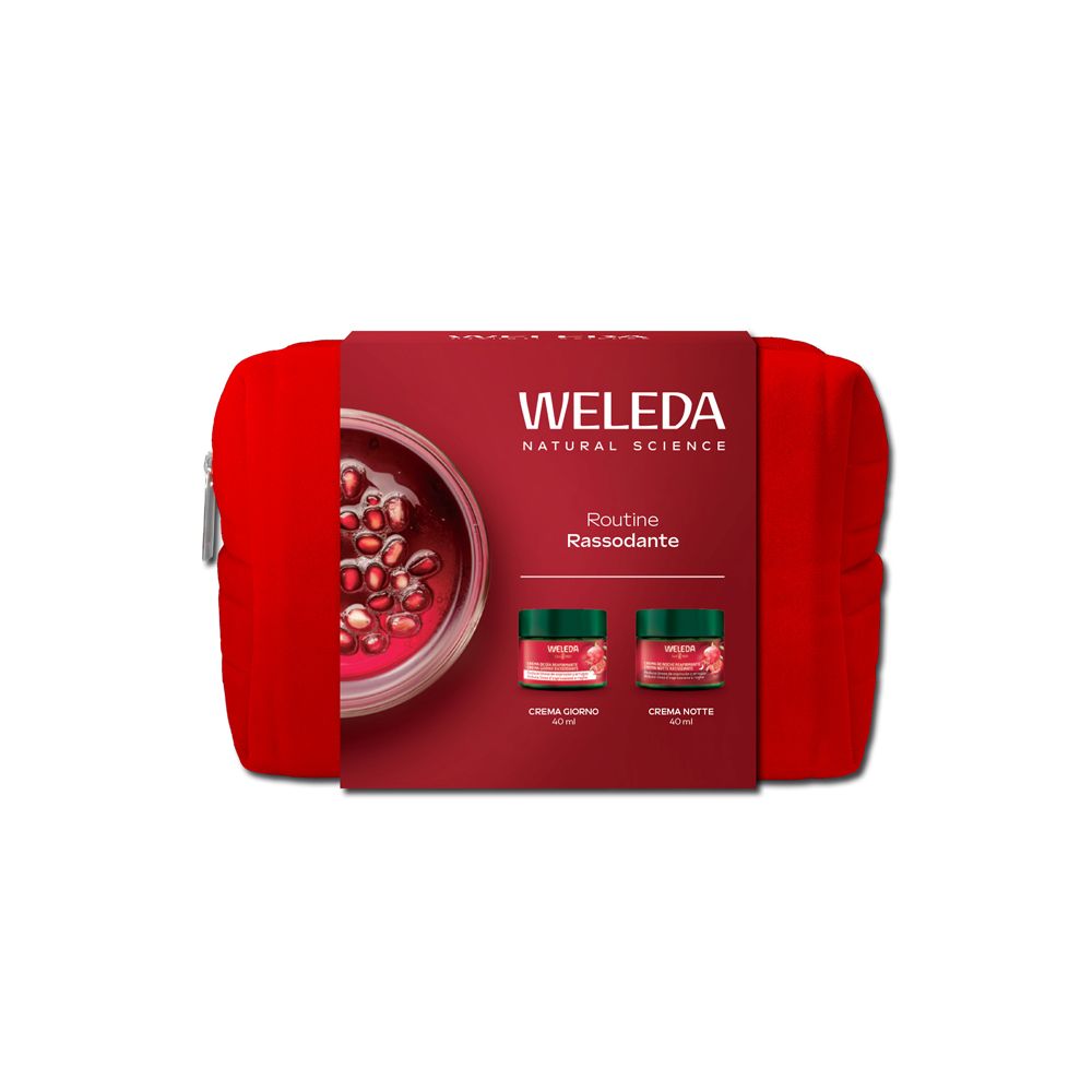 Beauty case rosso con confezione del prodotto. Sulla confezione sono visibili il marchio Weleda e un melograno.