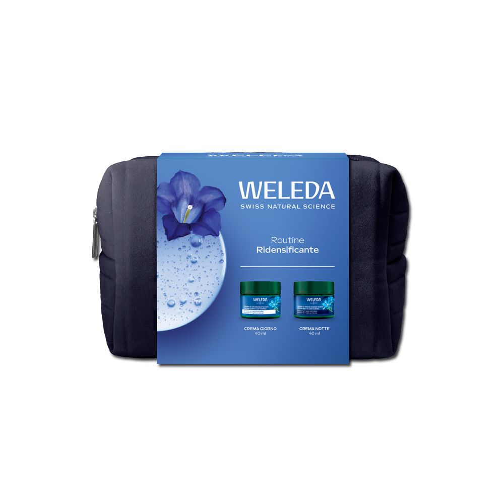 Borsetta blu scuro con una scatola con la scritta "WELEDA" e "Routine Ridensificante". Sono visibili due vasetti di crema verdi.