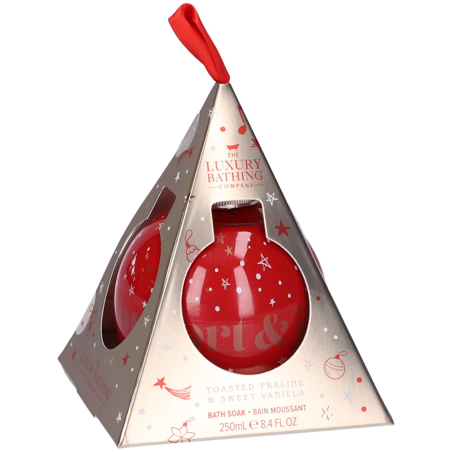 Bagnoschiuma a sfera rossa in confezione piramidale. Scritta: The Luxury Bathing Company, Toasted Praline & Sweet Vanilla.