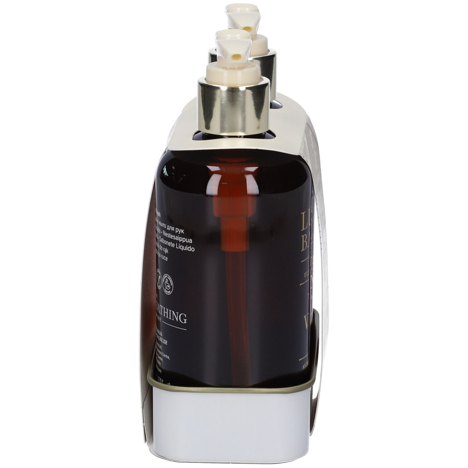 Due flaconi marroni con dosatore in supporto bianco. Vista laterale.