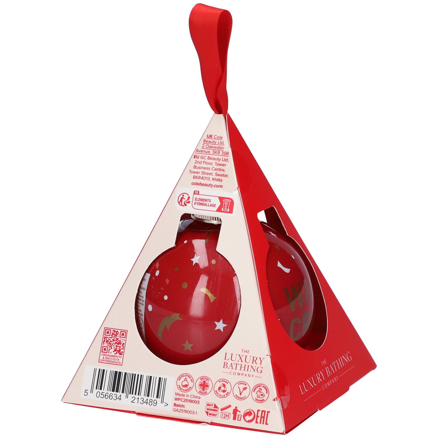 Sfera rossa in confezione triangolare rossa. Scritta: The Luxury Bathing Company. Con anello rosso per appendere.