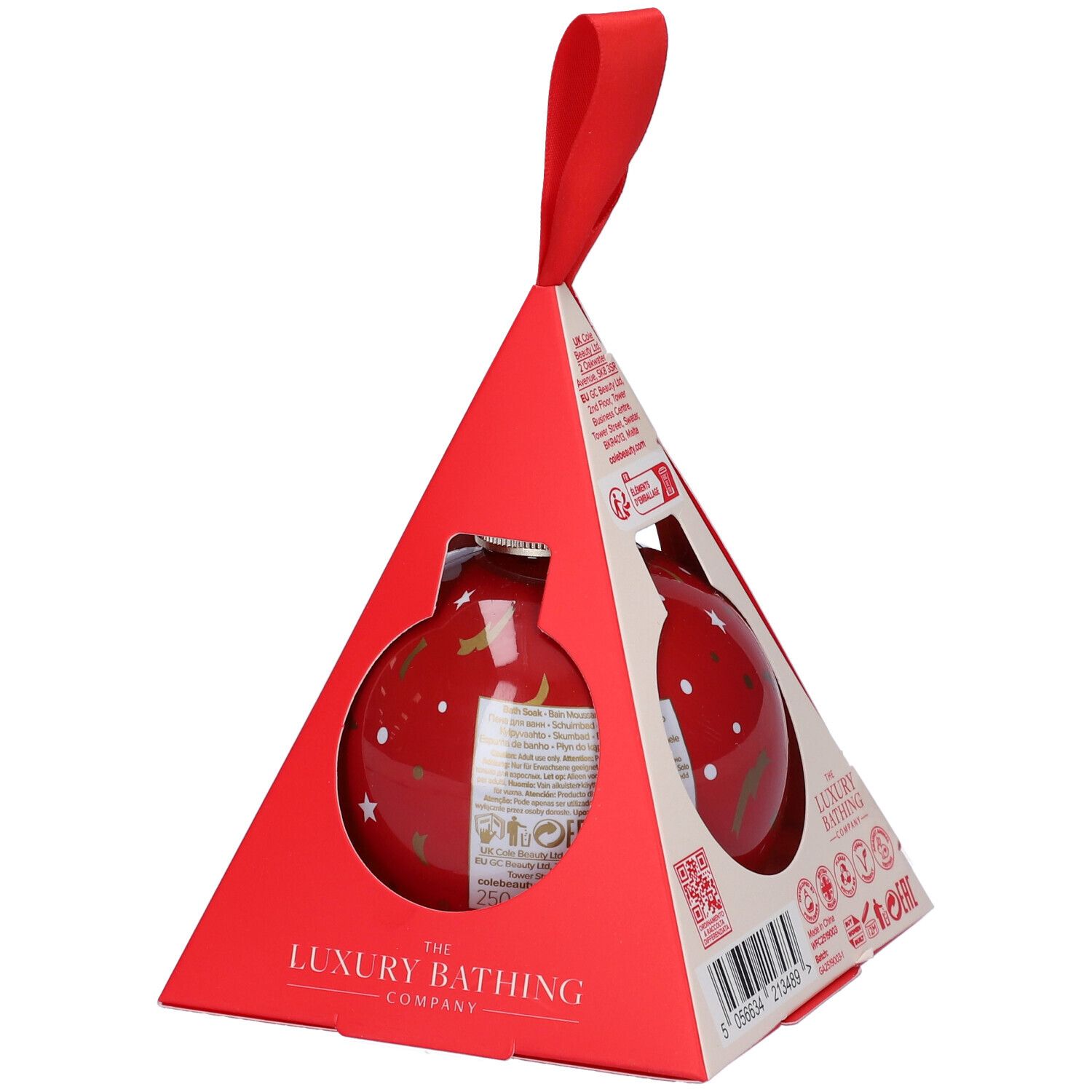 Sfera rossa in confezione triangolare rossa. Scritta: The Luxury Bathing Company. Con anello rosso per appendere.