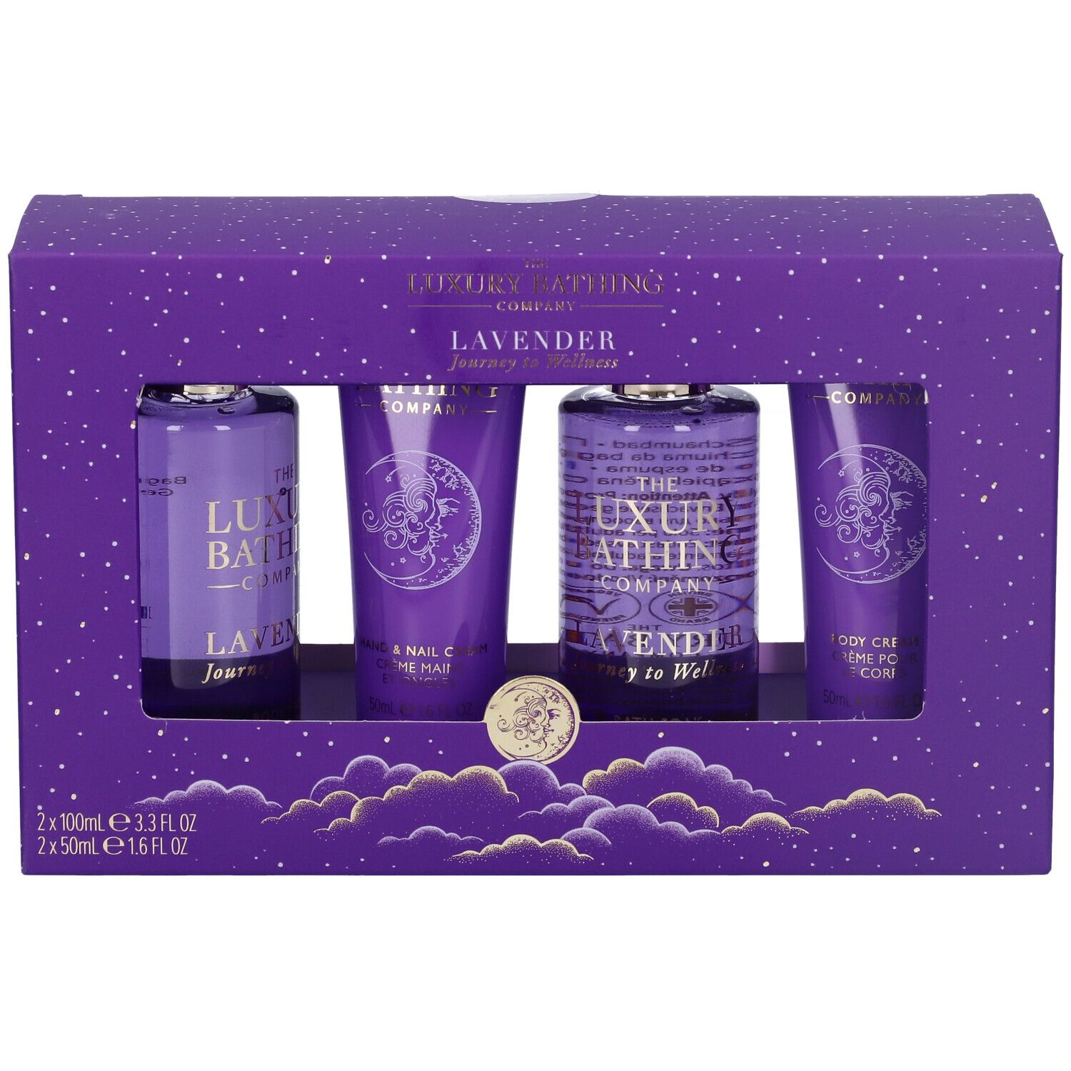 Confezione regalo viola con quattro prodotti. Gel doccia, crema corpo, crema mani e bagnoschiuma. Marchio: The Luxury Bathing Company.