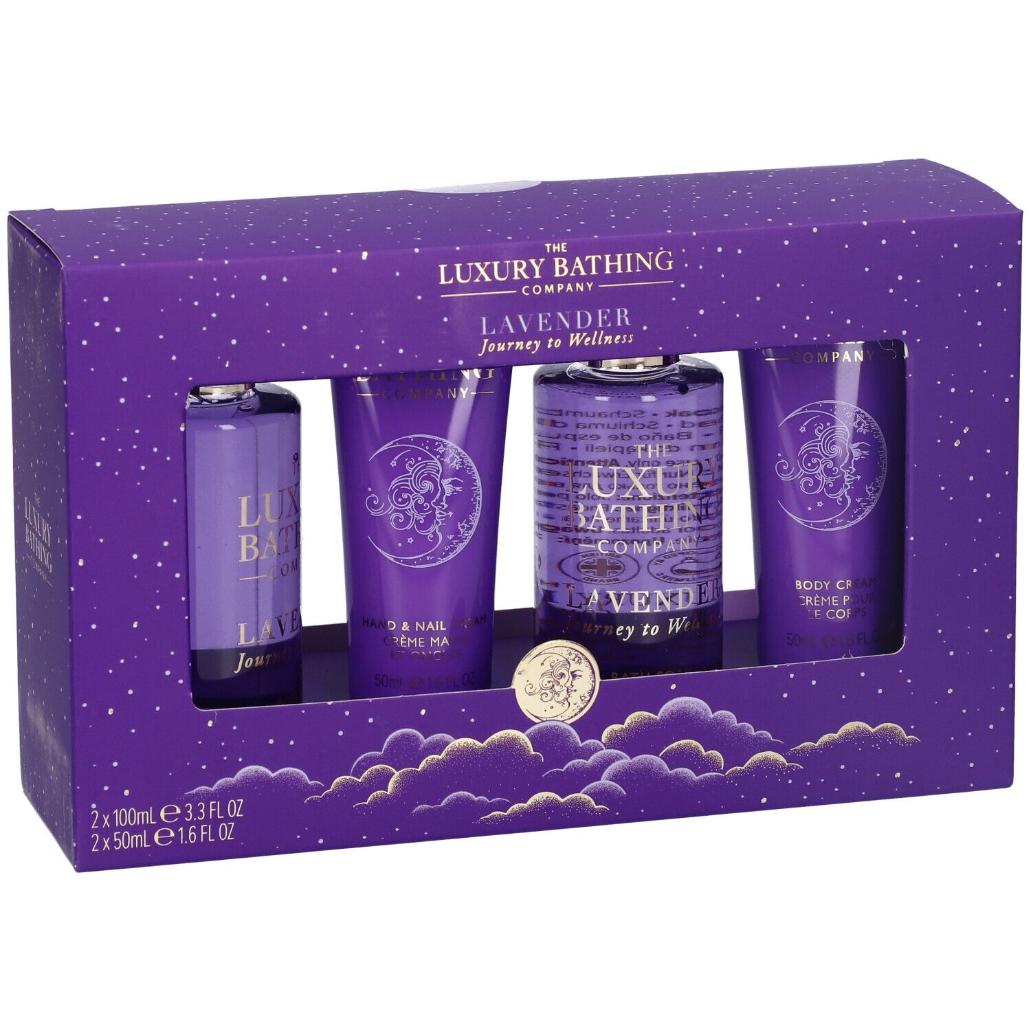Confezione regalo viola con quattro prodotti. Gel doccia, crema corpo, crema mani e bagnoschiuma. Marchio: The Luxury Bathing Company.