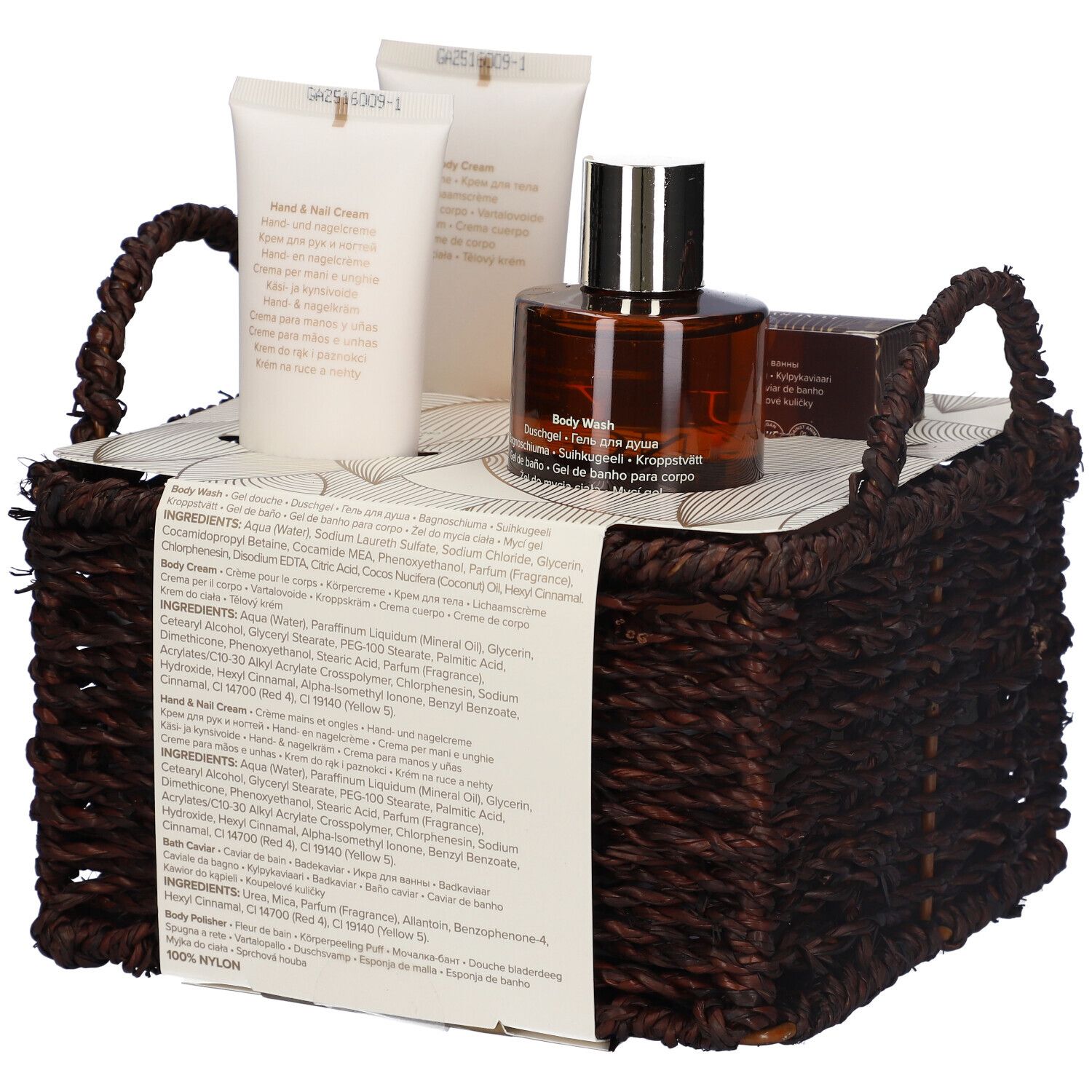 Set regalo in un cesto marrone. Contiene gel doccia, crema mani, crema corpo, perle da bagno e profumo.