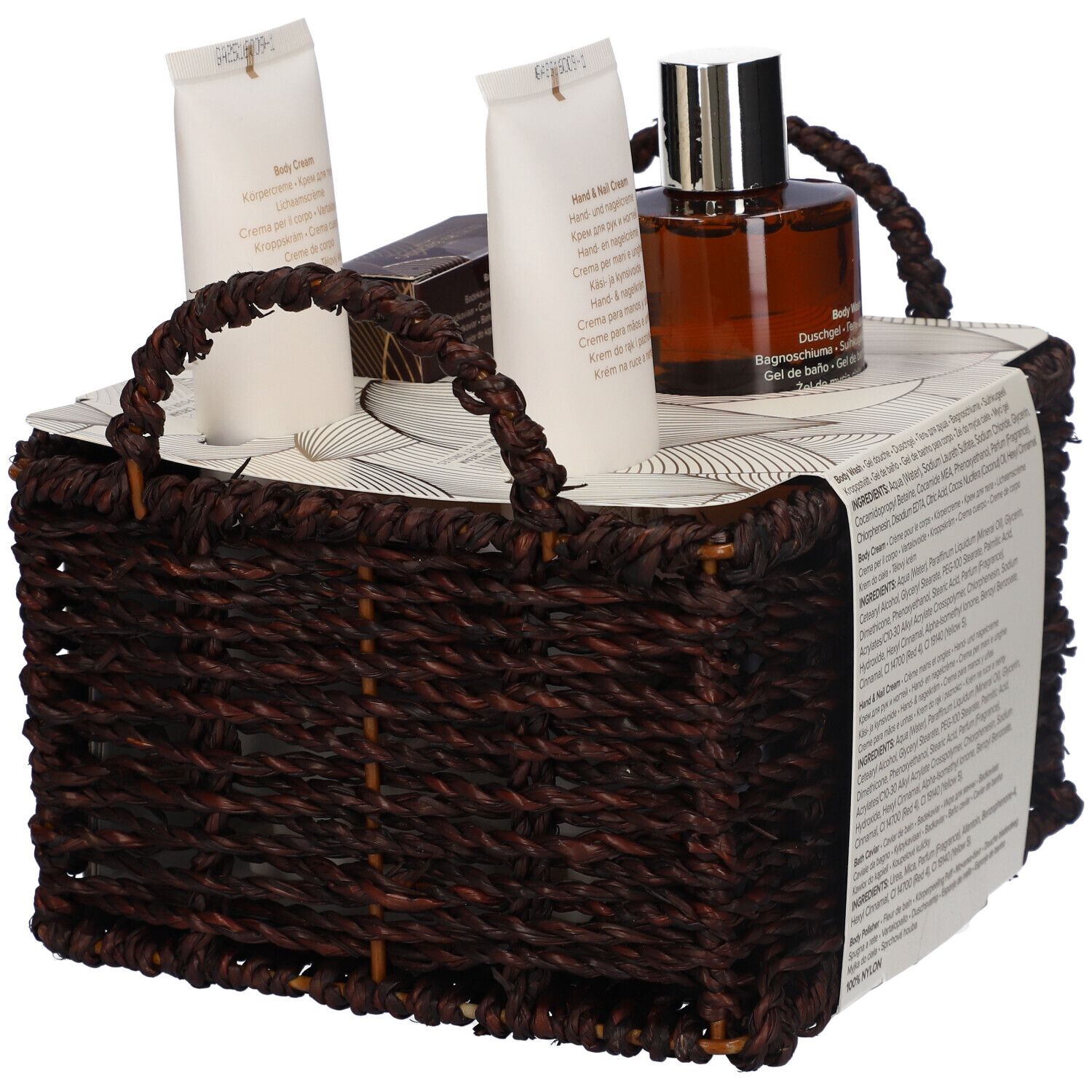 Set regalo in un cesto marrone. Contiene gel doccia, crema mani, crema corpo, perle da bagno e profumo.