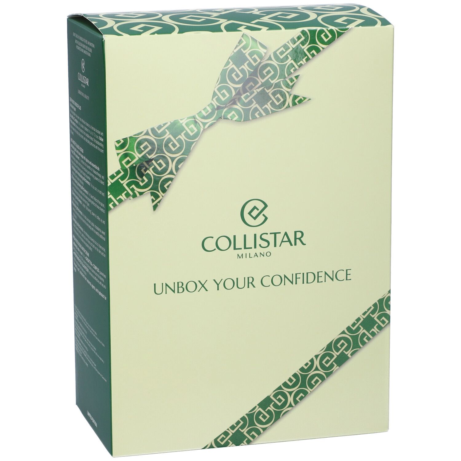 Confezione regalo con motivo a nastro verde. Logo: Collistar Milano. Testo: Unbox Your Confidence.