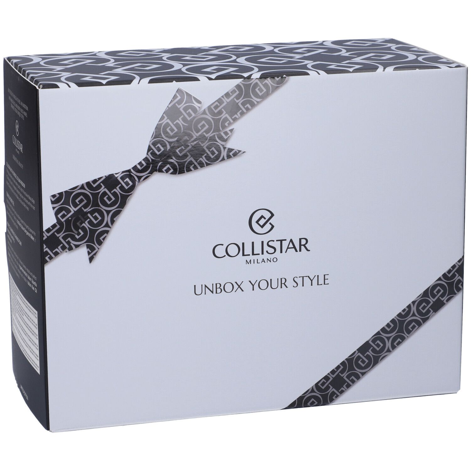 Scatola bianca con motivo nero e fiocco. Logo e scritta Collistar Milano, Unbox Your Style.