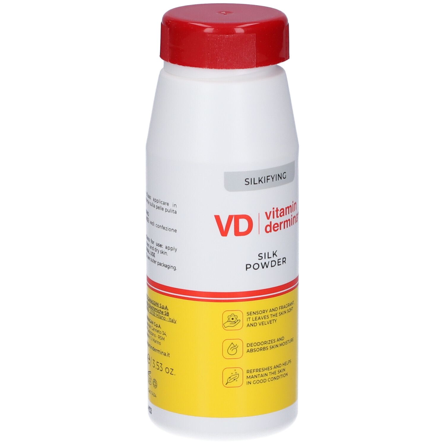 Flacone bianco e giallo con tappo rosso. Scritta: VD vitamin dermina, Silk Powder. Testo in inglese e italiano.