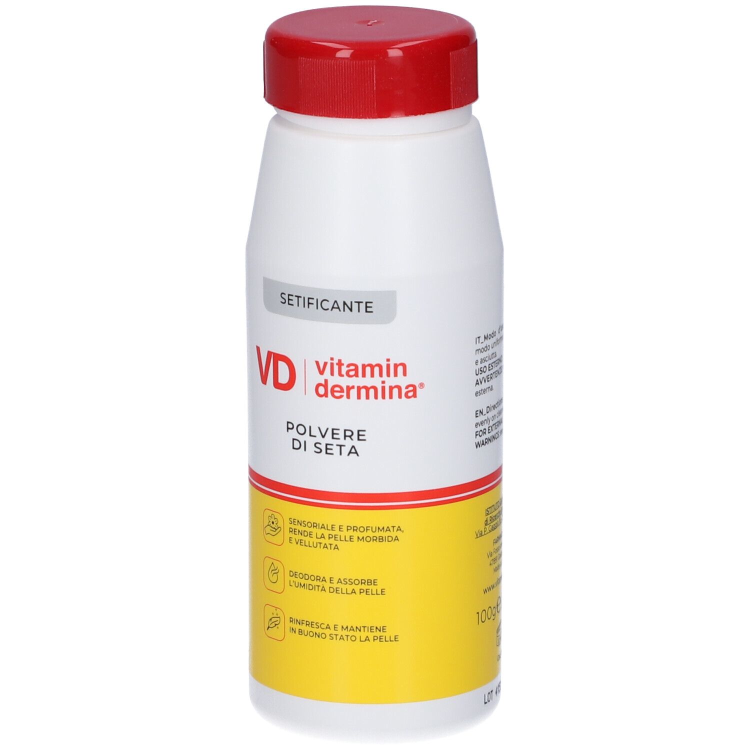 Flacone bianco e giallo con tappo rosso. Scritta: VD vitamin dermina, Polvere di Seta. Testo in italiano.