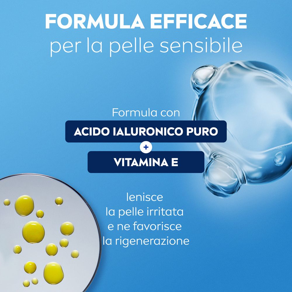 Grafica con gocce e testo. Testo: Formula con acido ialuronico e vitamina E. Lenisce la pelle irritata e ne favorisce la rigenerazione.