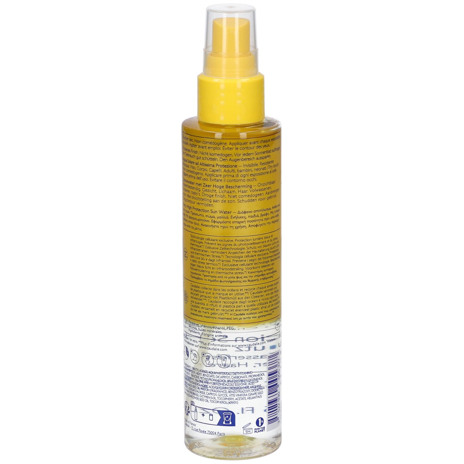 Retro del flacone spray solare. Testo multilingue. Scritta: 150 ml. Informazioni sull'uso.