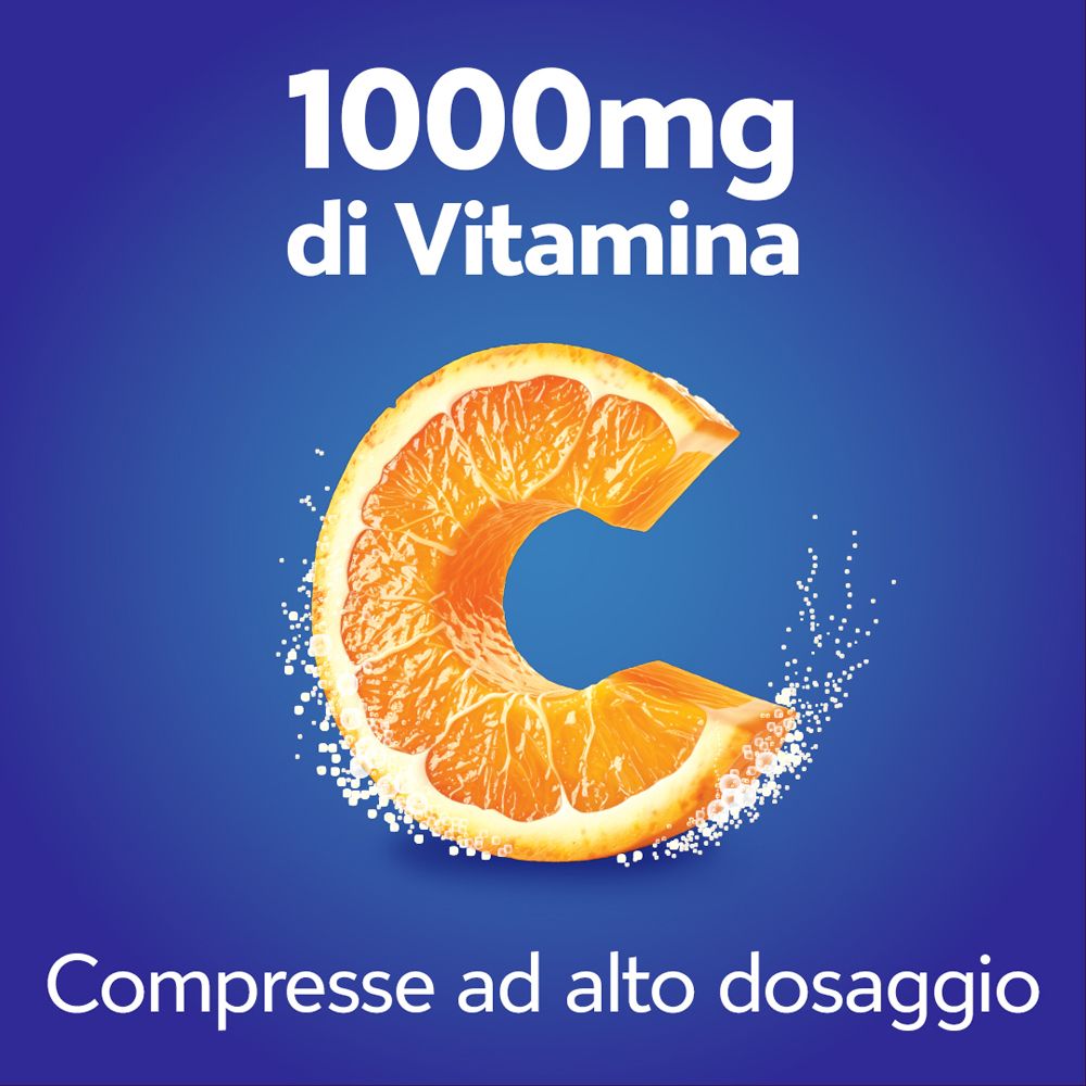 Sfondo blu con mezza arancia e cristalli di vitamina C. Testo: 1000mg di Vitamina C, Compresse ad alto dosaggio.