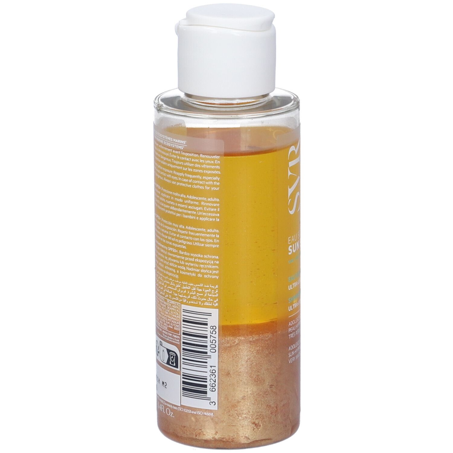 Flacone con tappo bianco. Scritta: SVR. Retro con testo e codice a barre. Contiene liquido dorato.