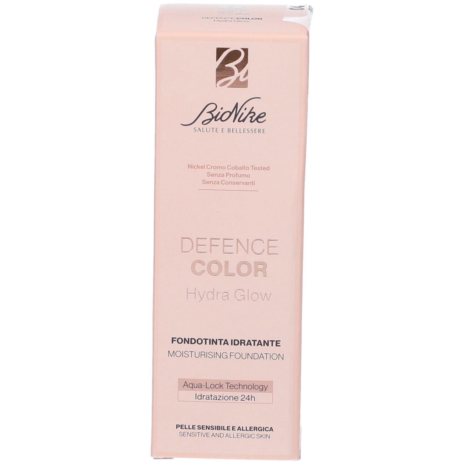 Confezione rosa con nome e logo del prodotto. Contiene testo: Defence Color Hydra Glow, Fondotinta Idratante, Aqua Lock Technology.