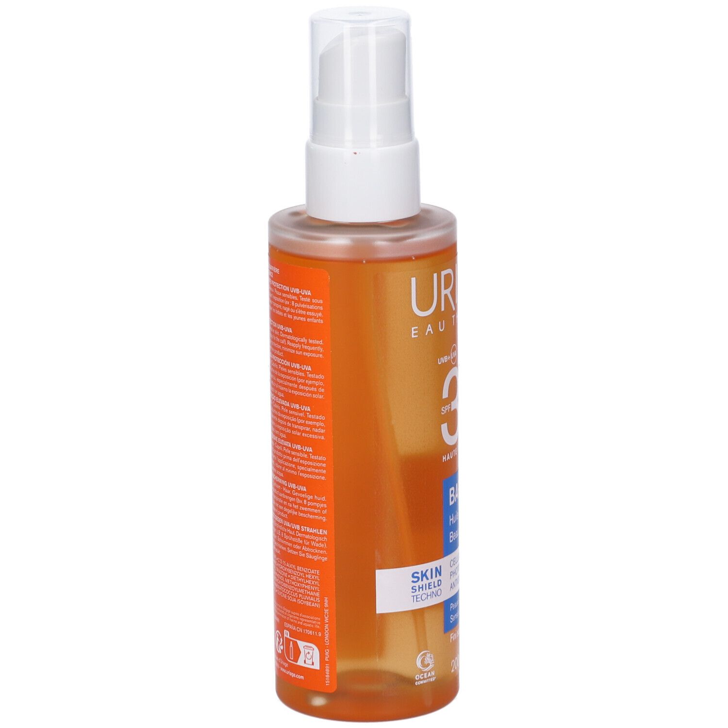 Flacone spray di olio solare. Liquido arancione, erogatore bianco. Etichetta con testo.