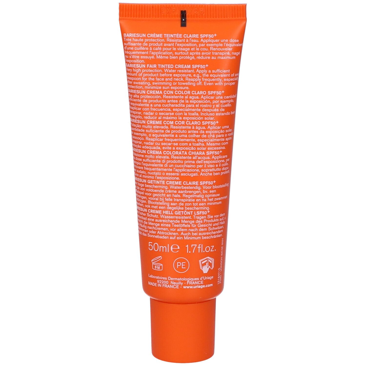 Retro del tubo. Testo multilingue. Sfondo arancione. Scritta nera.