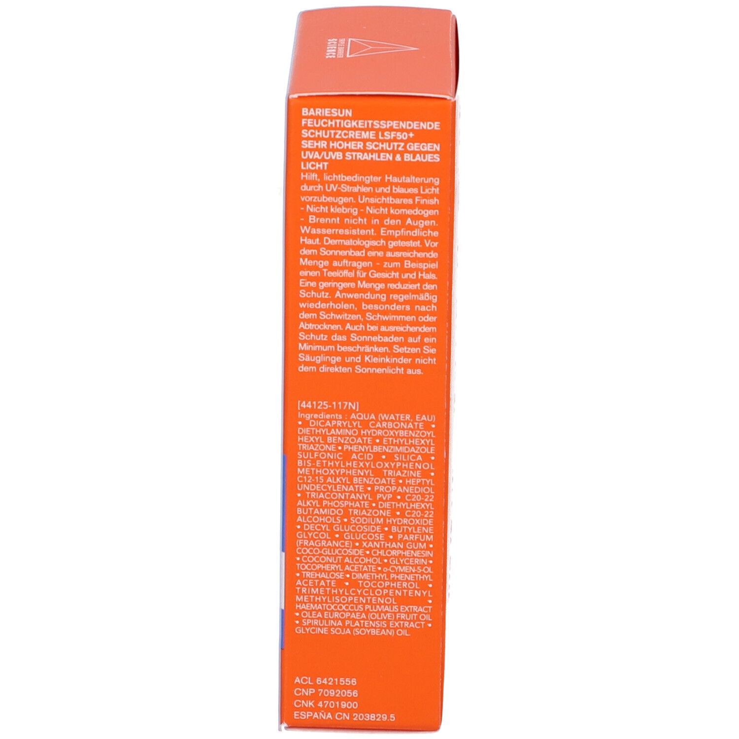 Lato della scatola arancione. Testo sulla protezione solare. Ingredienti.