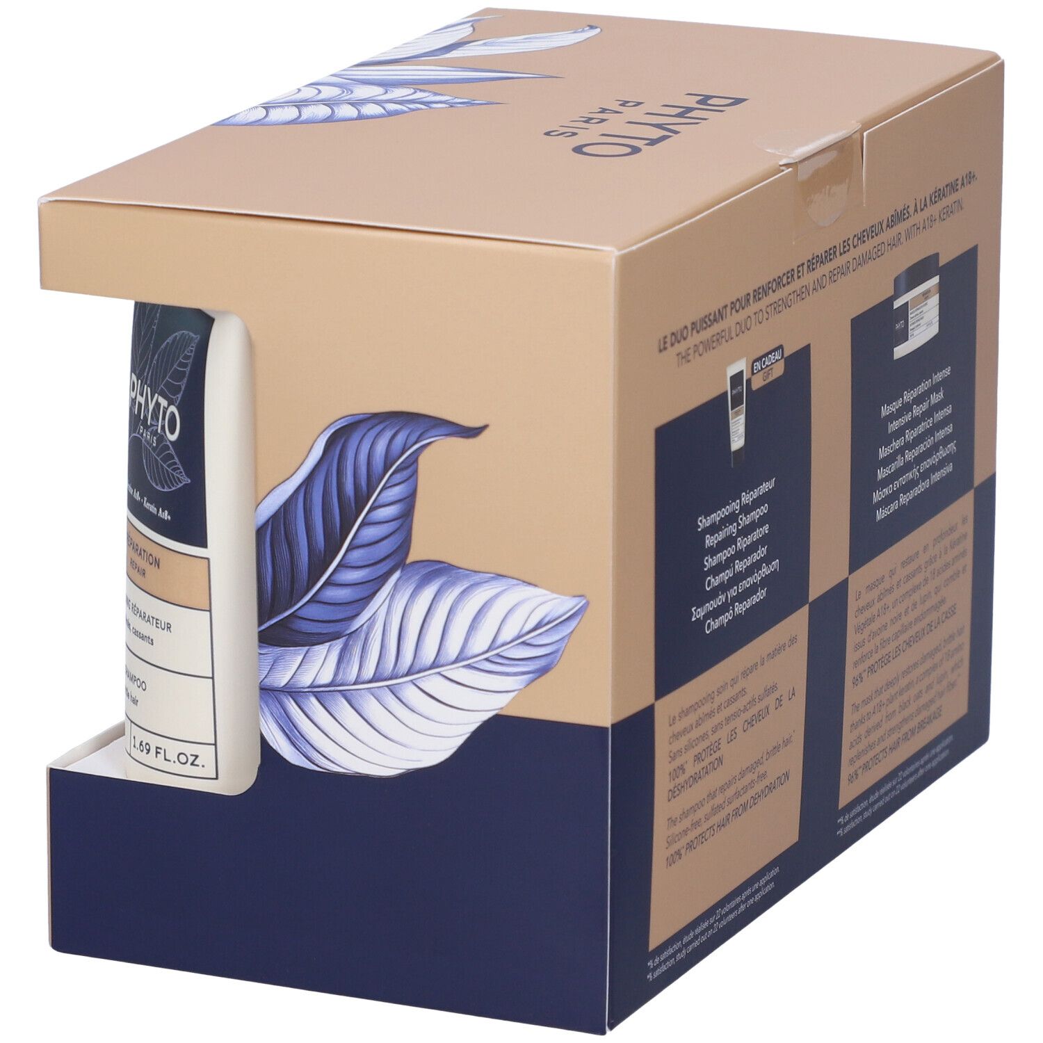 Confezione regalo con shampoo e maschera per capelli. Scatola con motivo a foglie blu e logo del marchio. Contiene due prodotti.