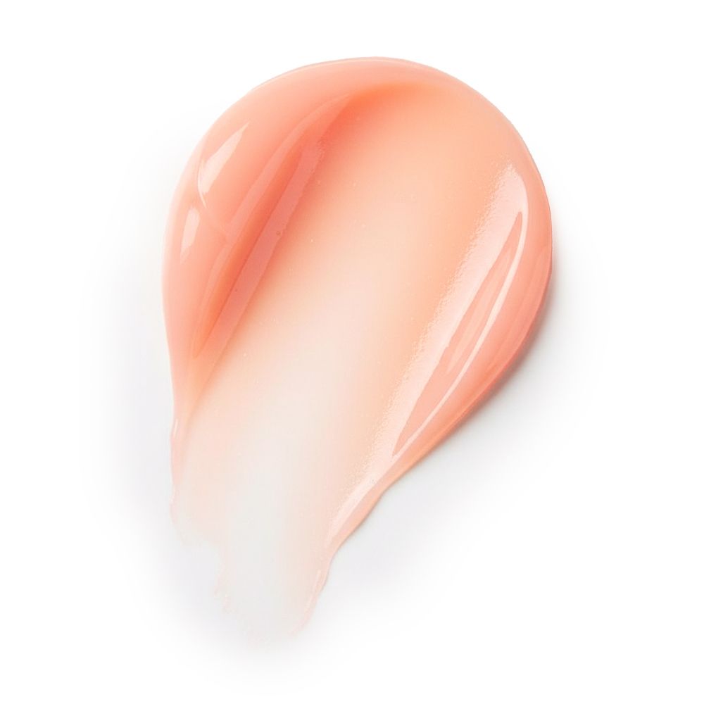 Campione di balsamo rosa su sfondo bianco. Texture lucida.