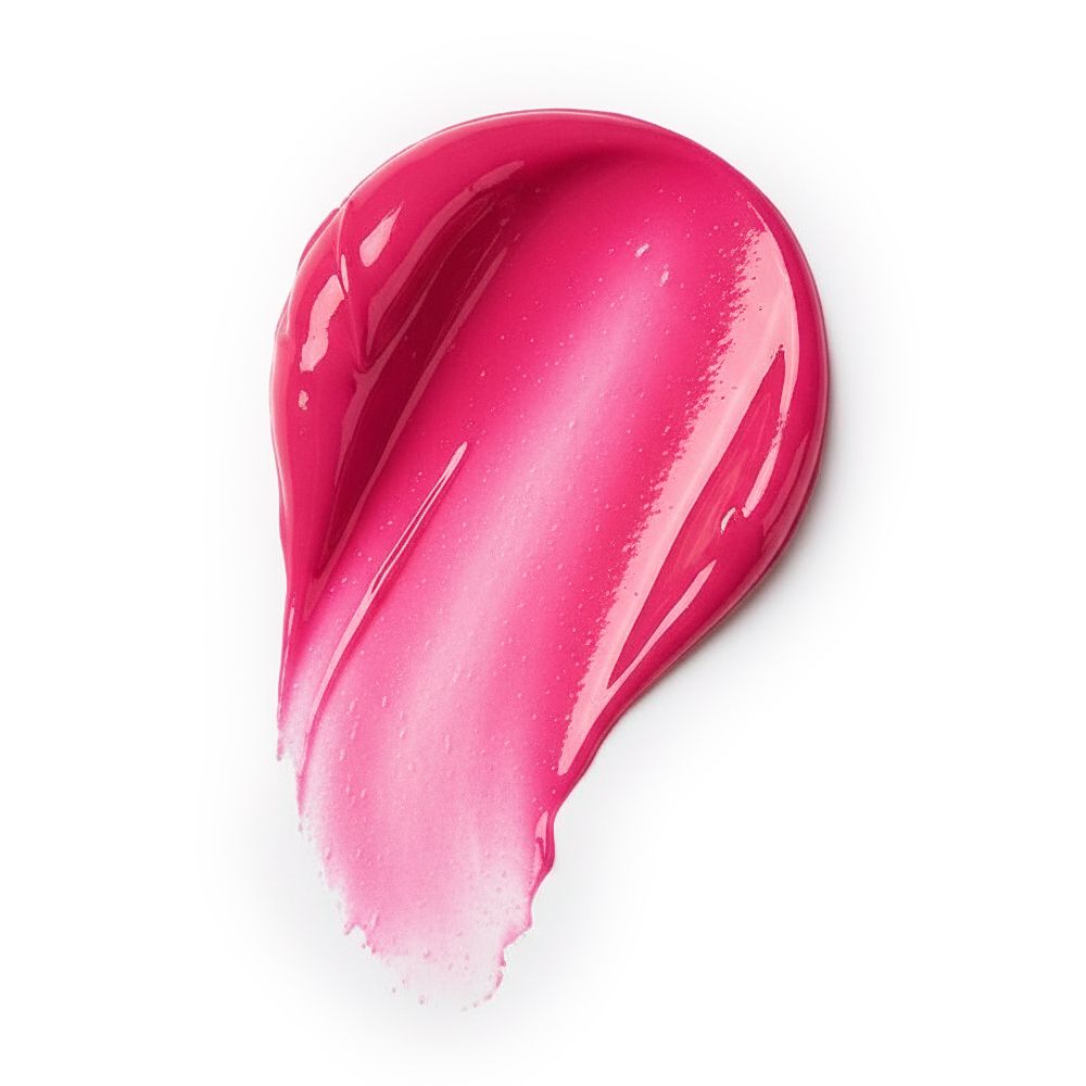 Striscio di balsamo labbra rosa su sfondo bianco. Colore e consistenza del prodotto chiaramente visibili.
