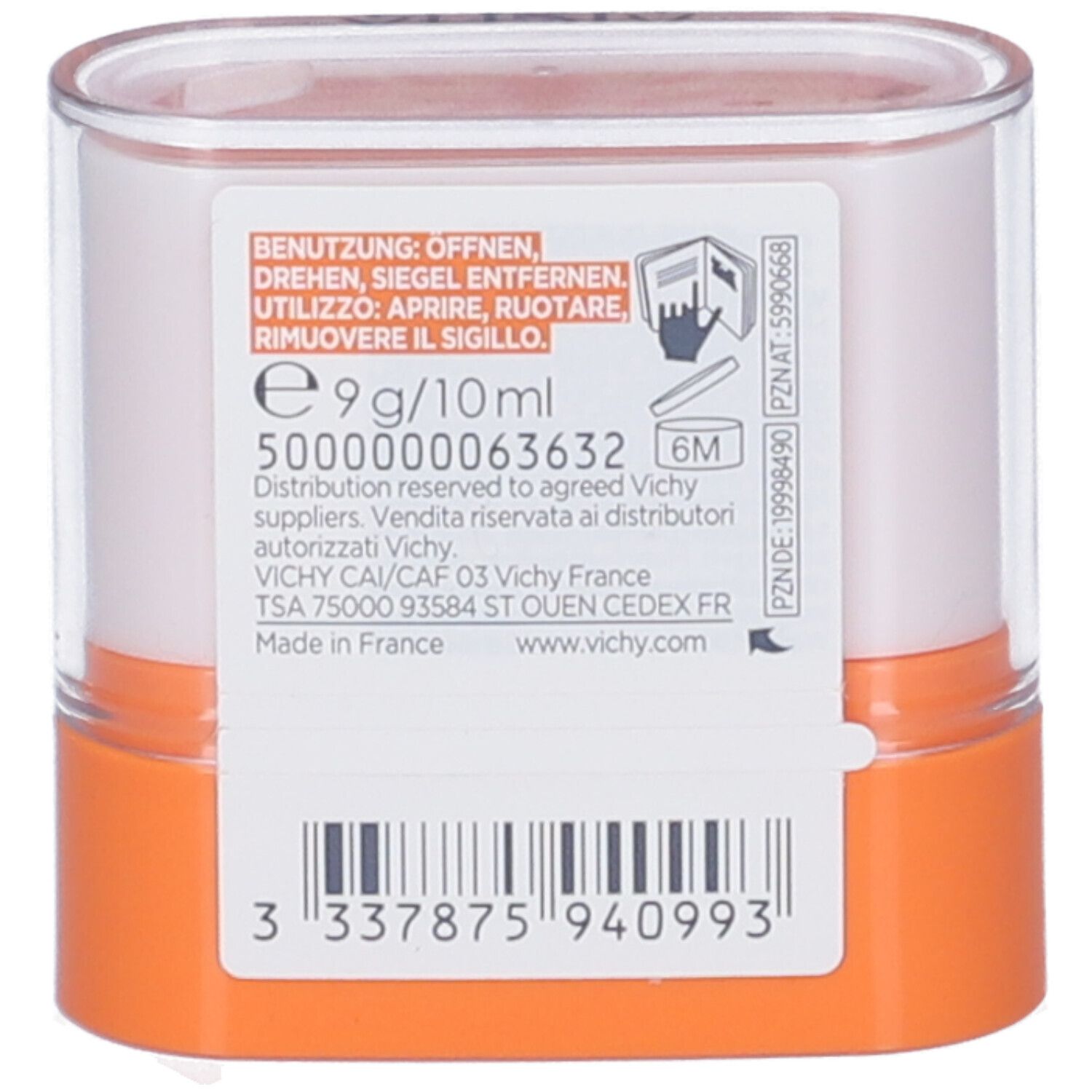 Retro dello stick solare UV Aqua SPF 50+ con informazioni, codice a barre e dettagli produttore. Sfondo arancione.